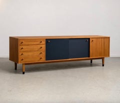 Light wood sideboard with contrasting black panels