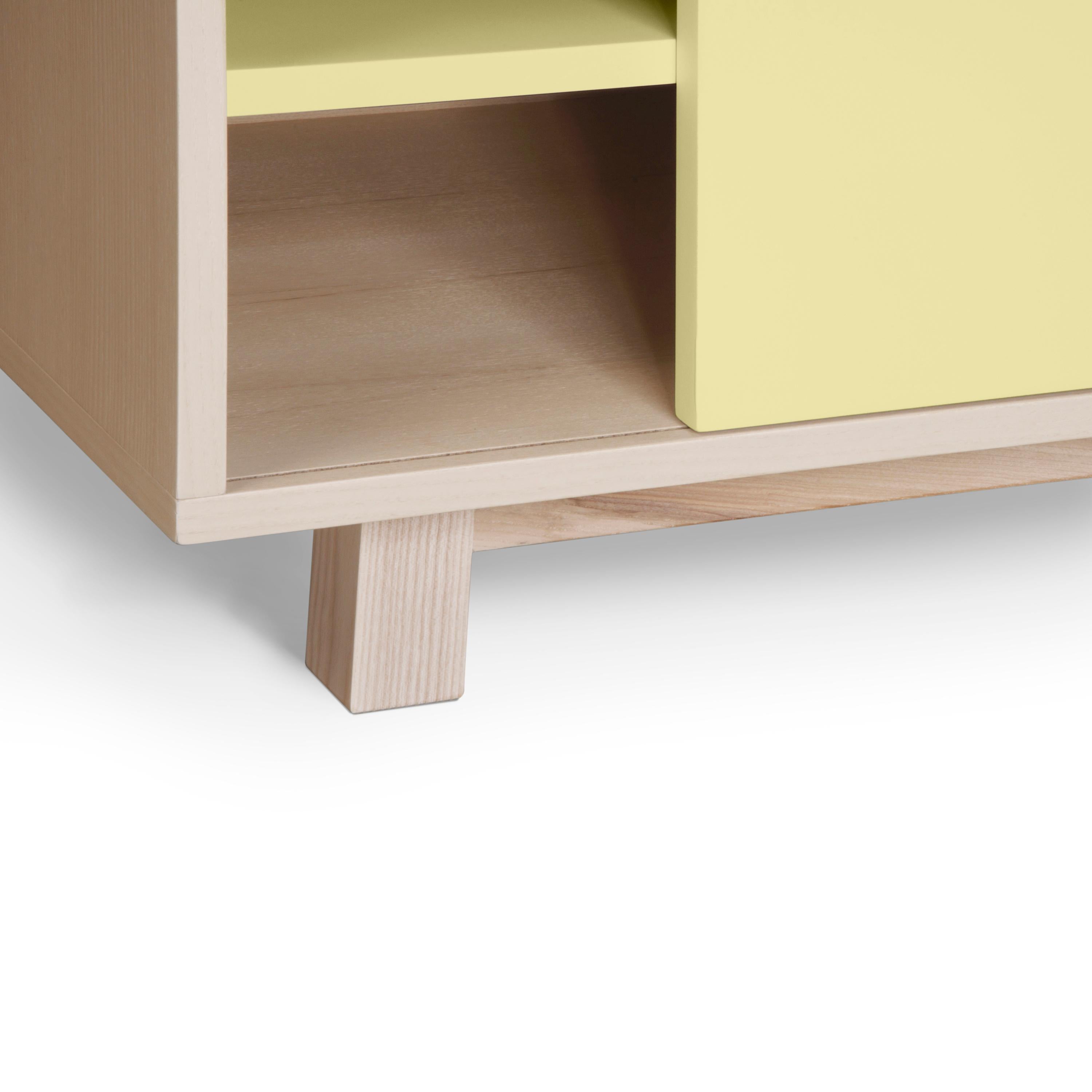 Contemporary light yellow 2-door TV cabinet in wood,  scandinavian design with 11 colours  For Sale