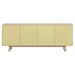 Aparador bajo de madera francés de 4 puertas amarillo claro, diseñado por Eric Gizard, París