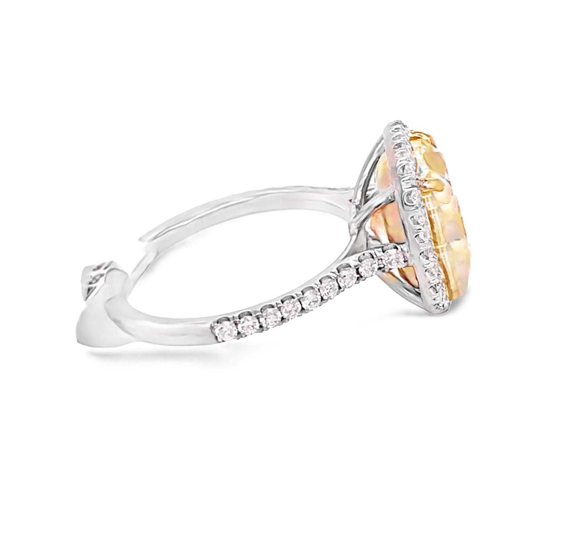 GIA Certified 5.02 Carat Light Yellow Cushion Cut Diamond Engagement Ring In Excellent Condition In Beverly Hills, CA