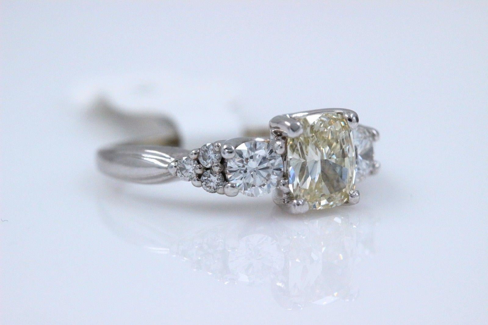 Women's Light Yellow Cushion Diamond Engagement Ring 1.51 Carat 14 Karat White Gold For Sale