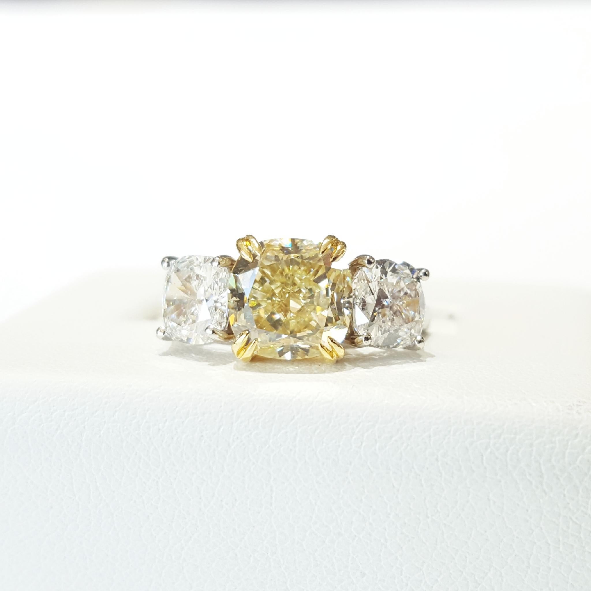 Women's Light Yellow Diamond Three-Stone Platinum Ring For Sale