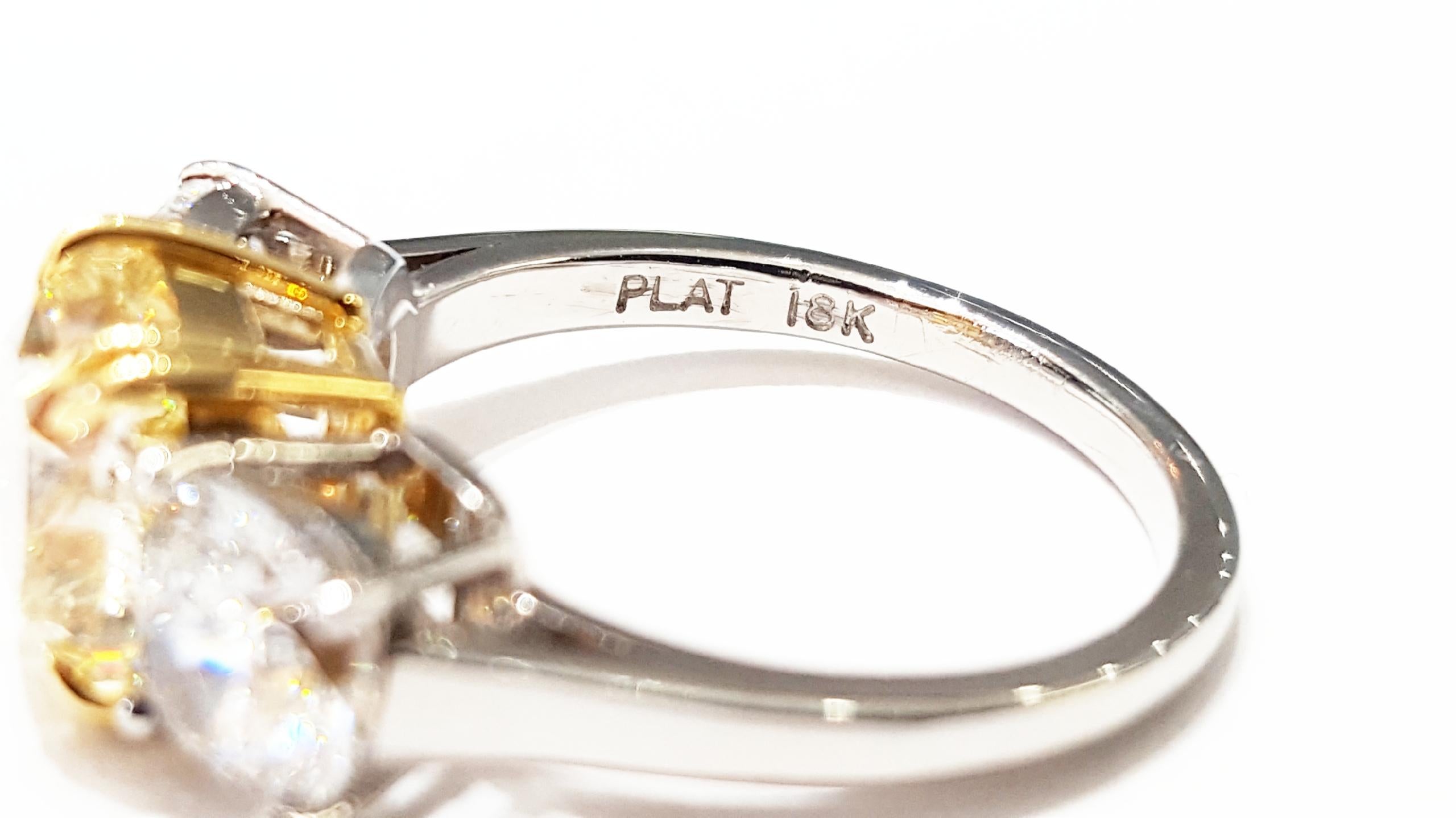 Light Yellow Diamond Three-Stone Platinum Ring For Sale 1
