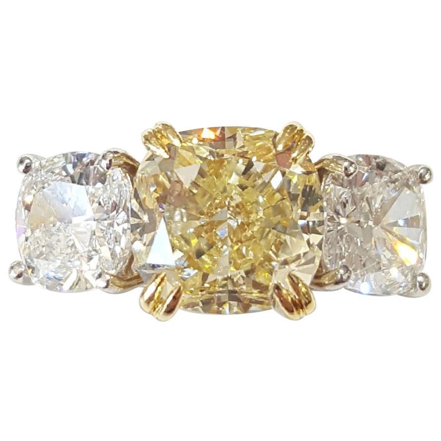 Light Yellow Diamond Three-Stone Platinum Ring For Sale