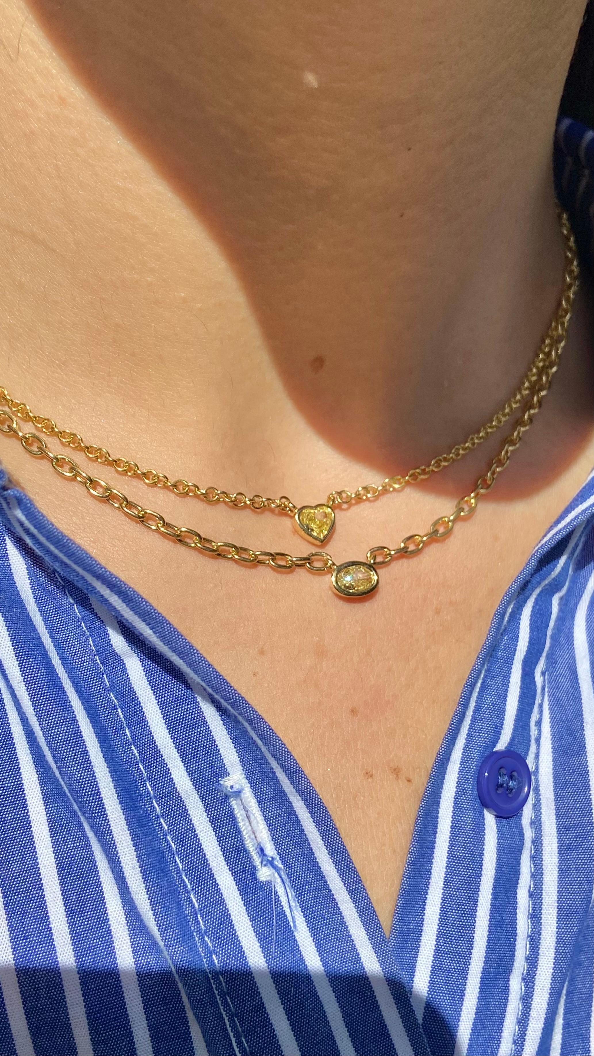 0.70 Carat 
Heart Shape Diamond
Light Yellow
VS+ Clarity 
18k Yellow Solid Gold Chain
16 Inches
Gold Bezel Setting
Handmade in NYC 

This piece can be viewed before purchase in our showroom in NYC, or at one of our retail partners throughout the