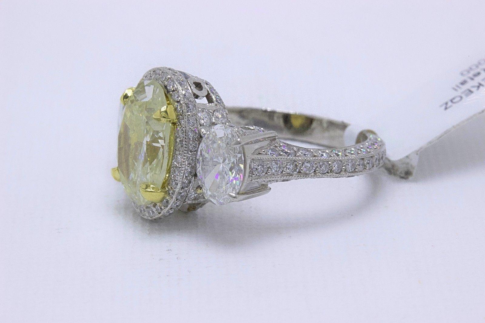 Light Yellow Oval Diamond Three-Stone Engagement Ring 6.44 Carat SI2 in Platinum 5