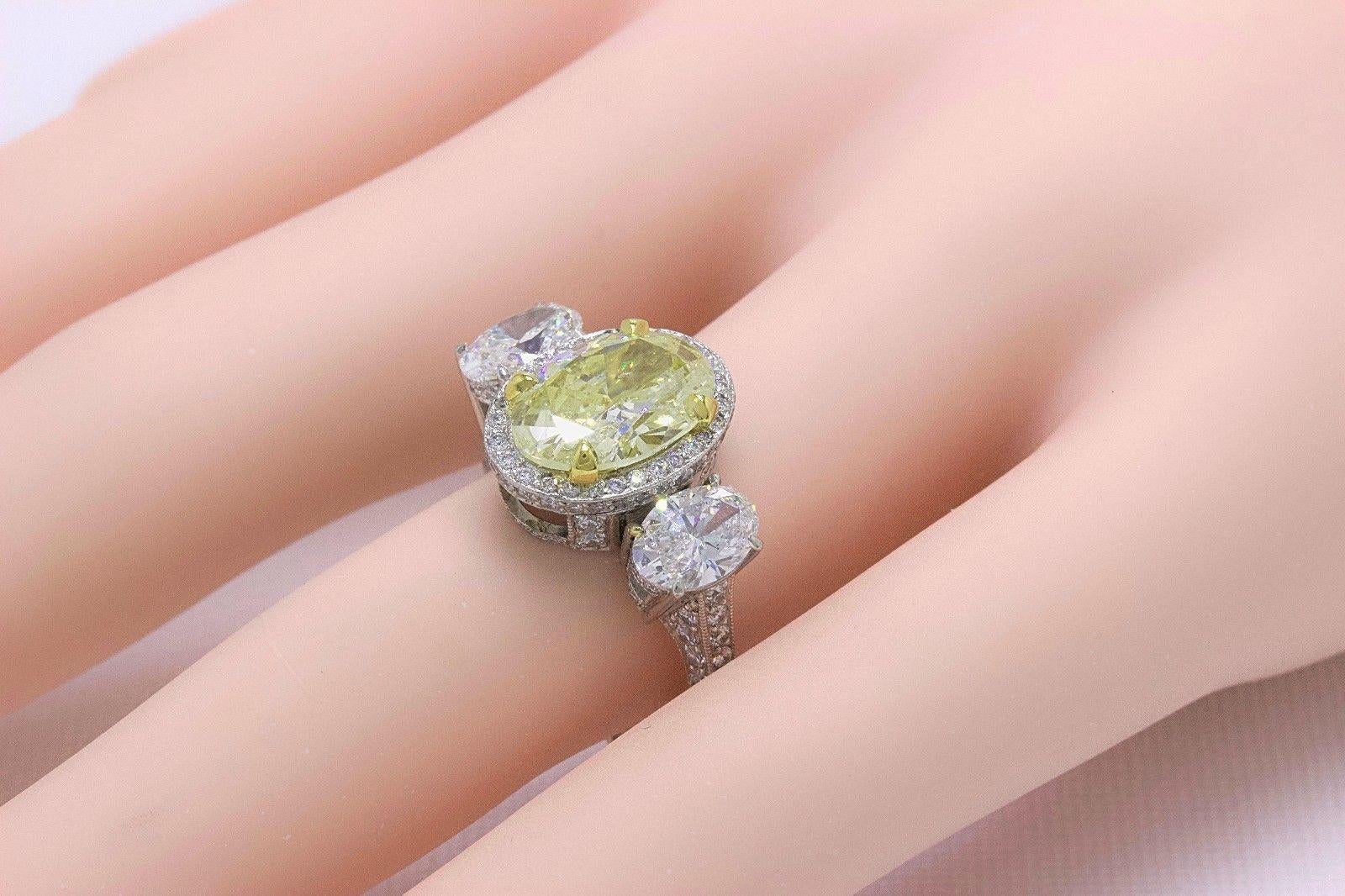 Light Yellow Oval Diamond Three-Stone Engagement Ring 6.44 Carat SI2 in Platinum 2