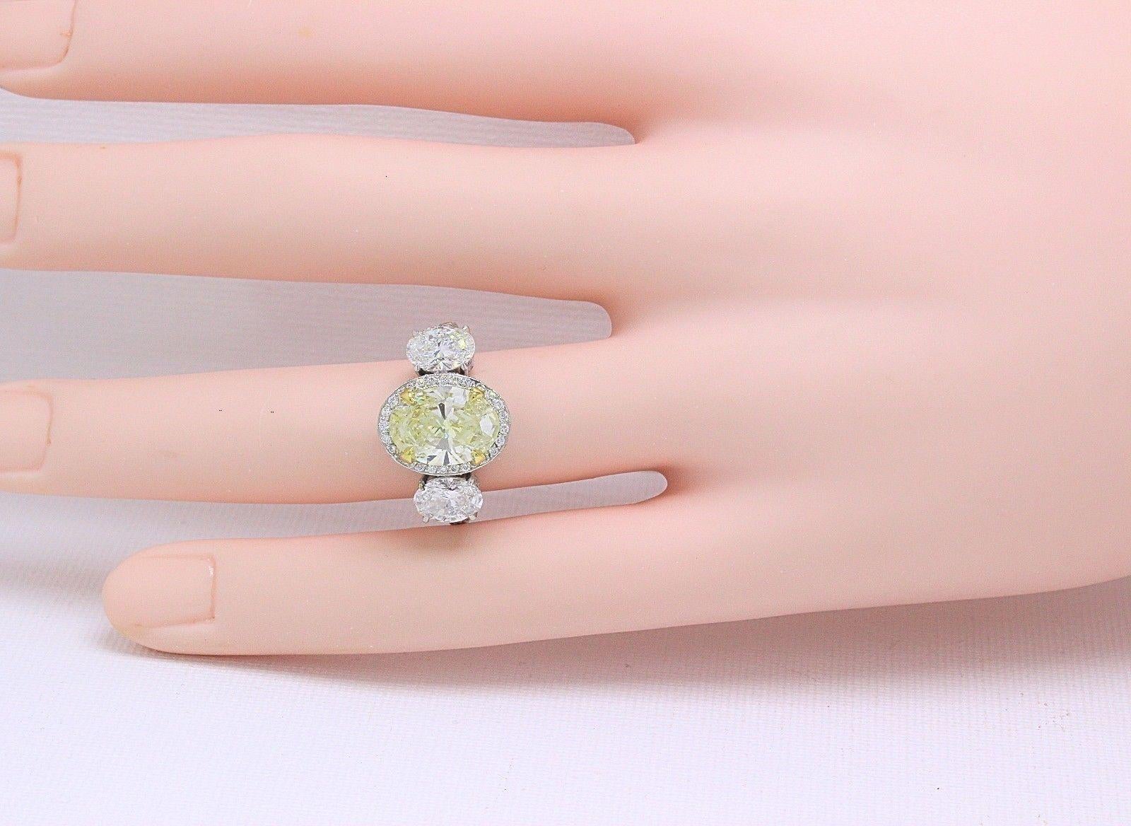 Light Yellow Oval Diamond Three-Stone Engagement Ring 6.44 Carat SI2 in Platinum 3