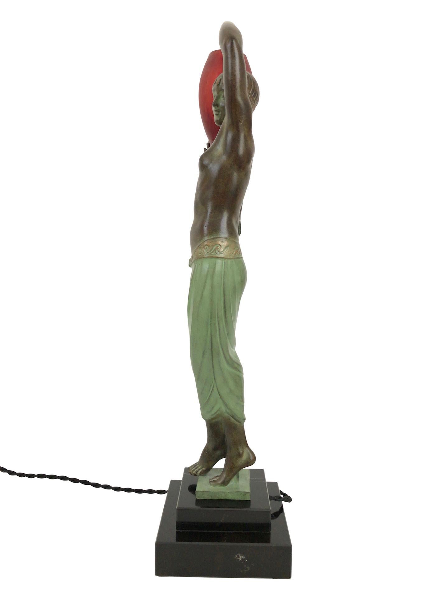 “Odalisque”
Designed in France during the roaring 1920s by “Fayral”, which is one of the pseudonymes from “Pierre Le Faguays” (1892-1962)
Original “Max Le Verrier”
Art Deco Style, France 

Lighted sculpture made in “Régule” (spelter)
Socle in black