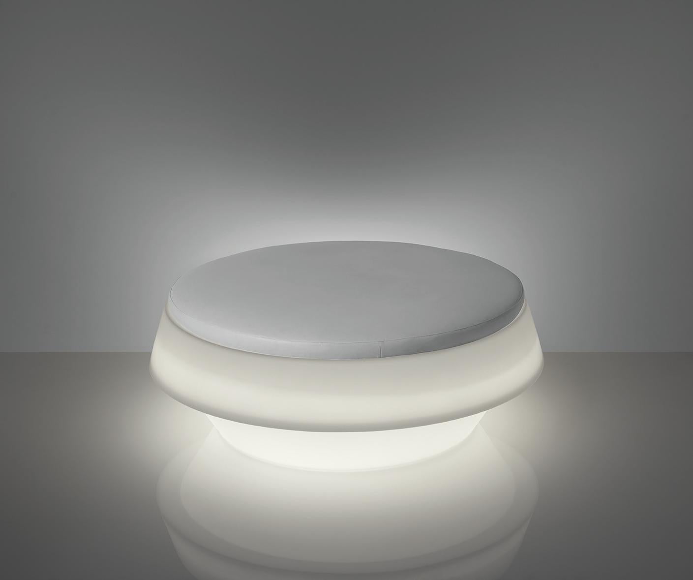 Lighted Giò Pouf by Giò Colonna Romano
Dimensions: Ø 145 x H 53 cm. Seat Height: 53 cm.
Materials: Polyethylene and eco-leather. 
Weight: 29 kg.

Extra shipping costs will occur due to the product volume. This product is suitable for indoor and