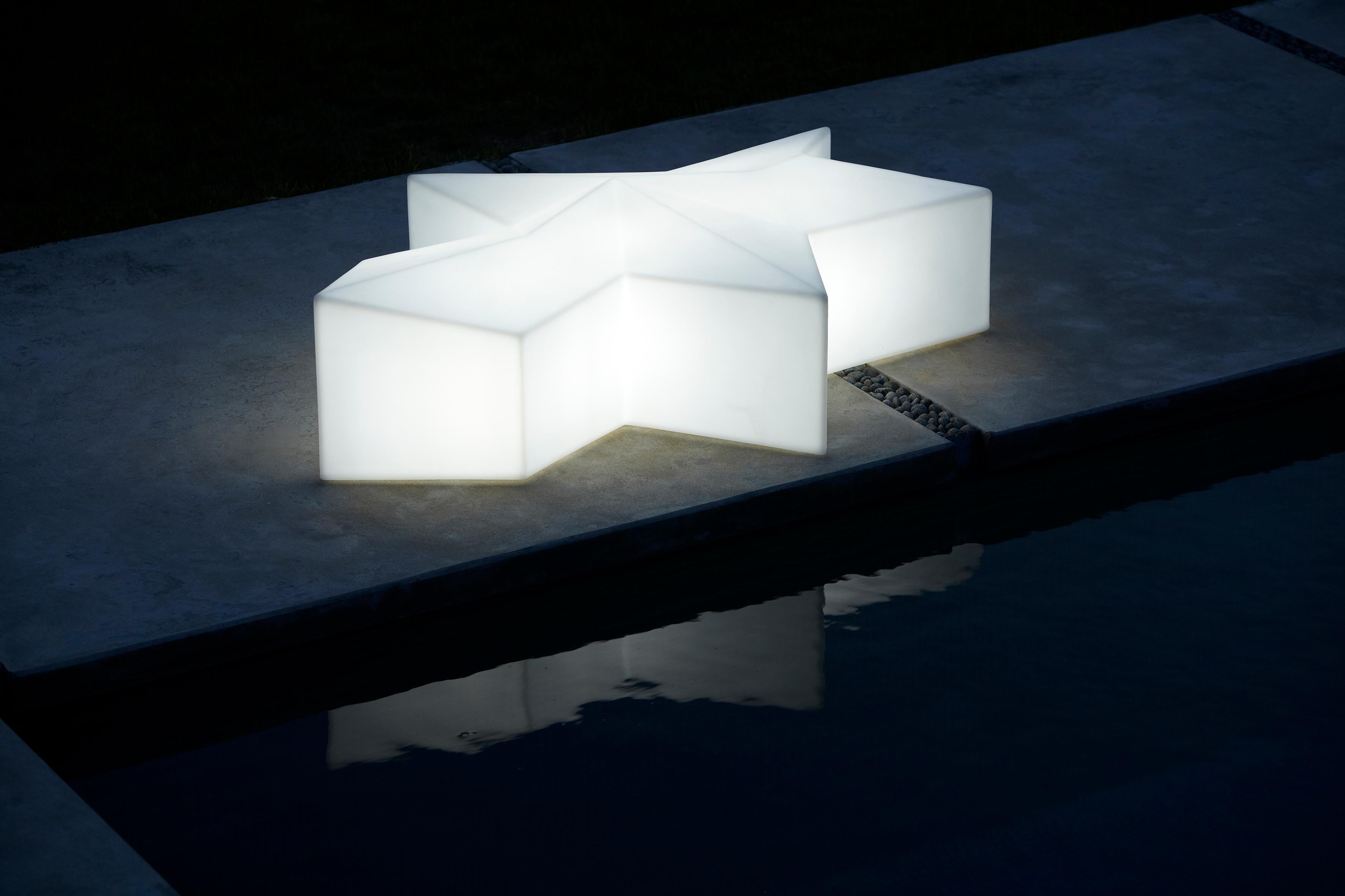Lighted Out Glacé Bench by Alessandro Mendini
Dimensions: D 125 x W 180 x H 50 cm. Seat Height: 50 cm.
Materials: Polyethylene.
Weight: 27 kg.

This product is suitable for indoor and outdoor use. Lighting system compatible with LED light bulbs.