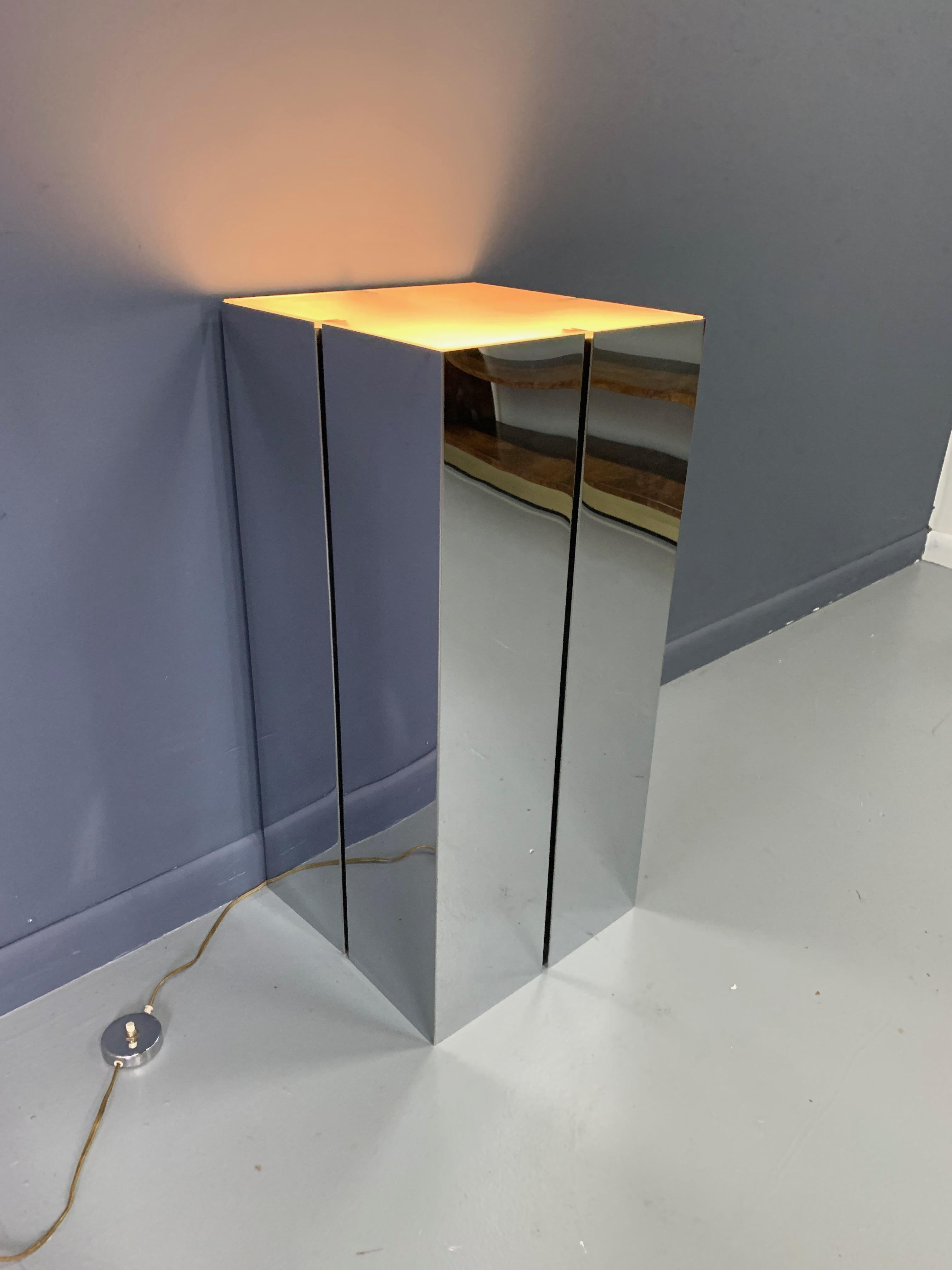 Chromed steel illuminated pedestal with frosted glass top designed by Neal Small for George Kovacs.