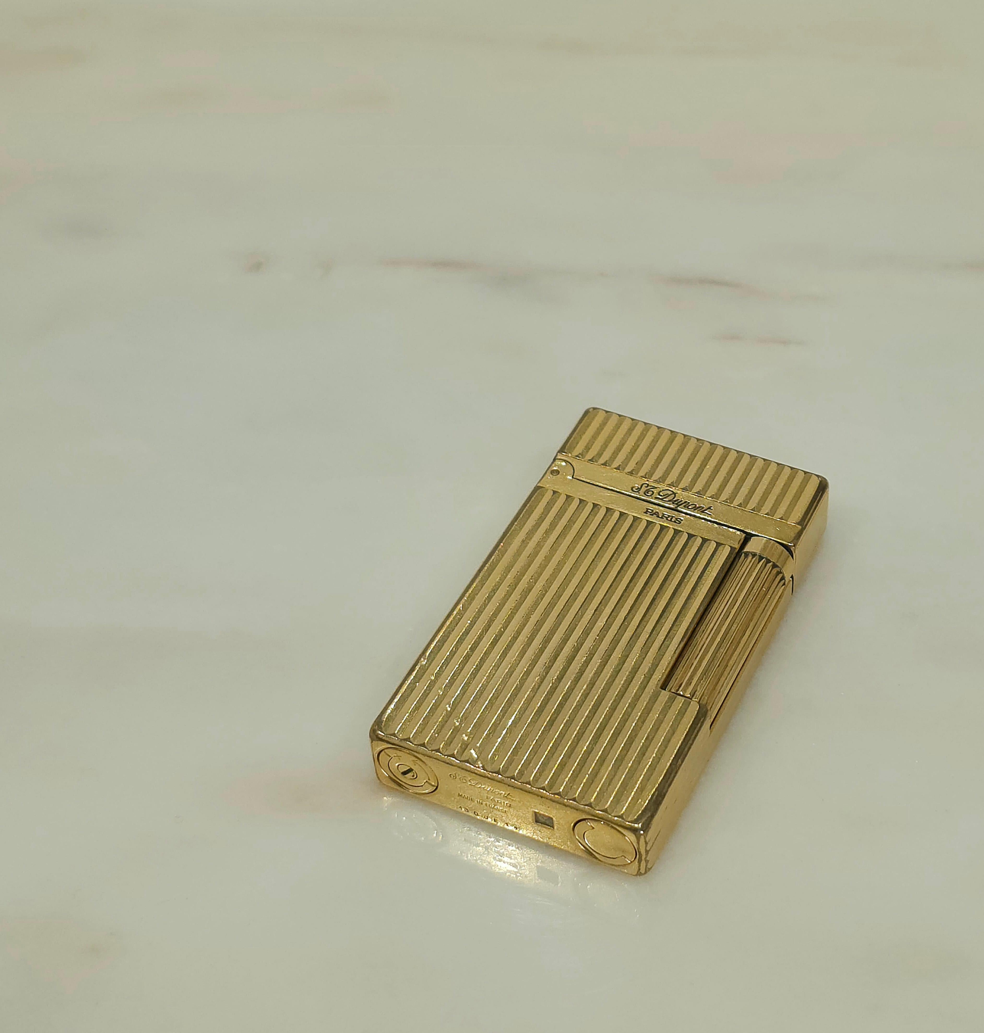 Mid-Century Modern Lighter S.T. Dupont Gold Yellow Line 2 Tobacco Accessories France Midcentury 70s For Sale