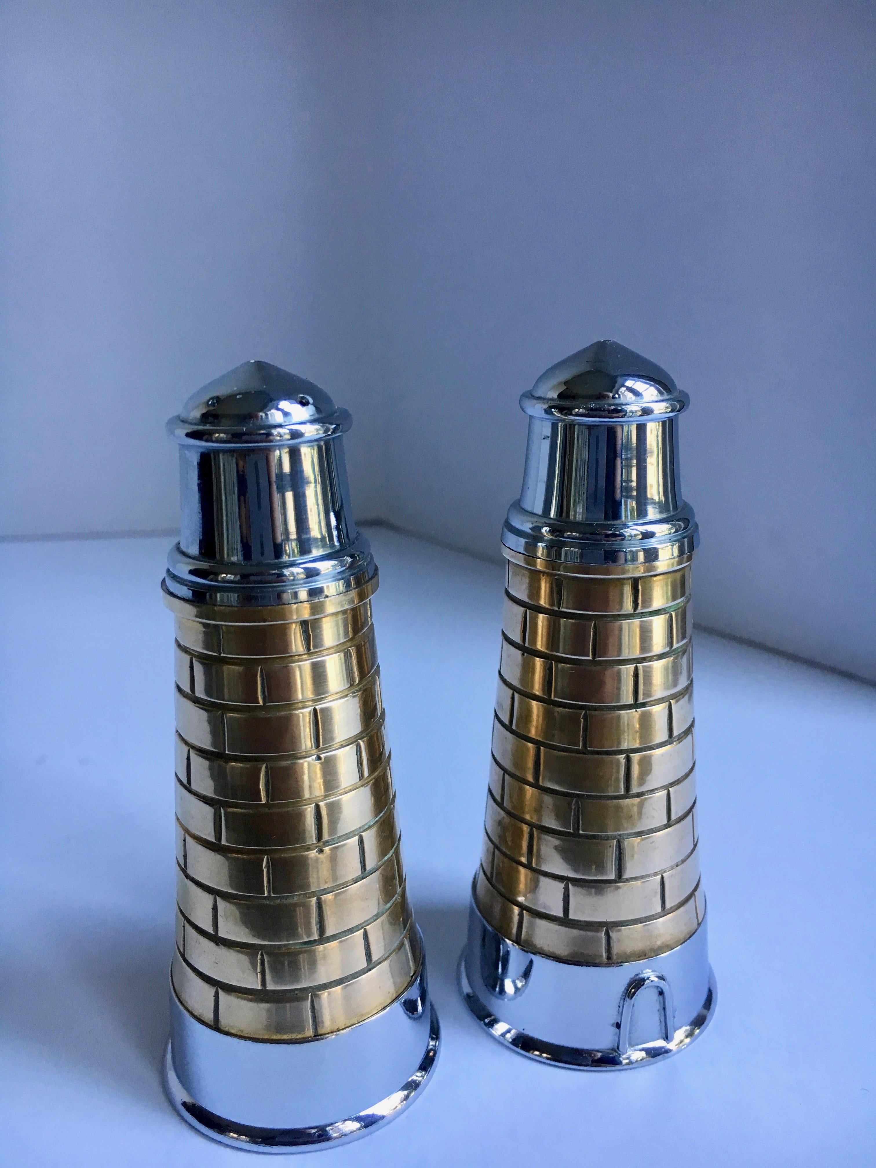 Lighthouse salt and pepper shakers - brass and stainless.