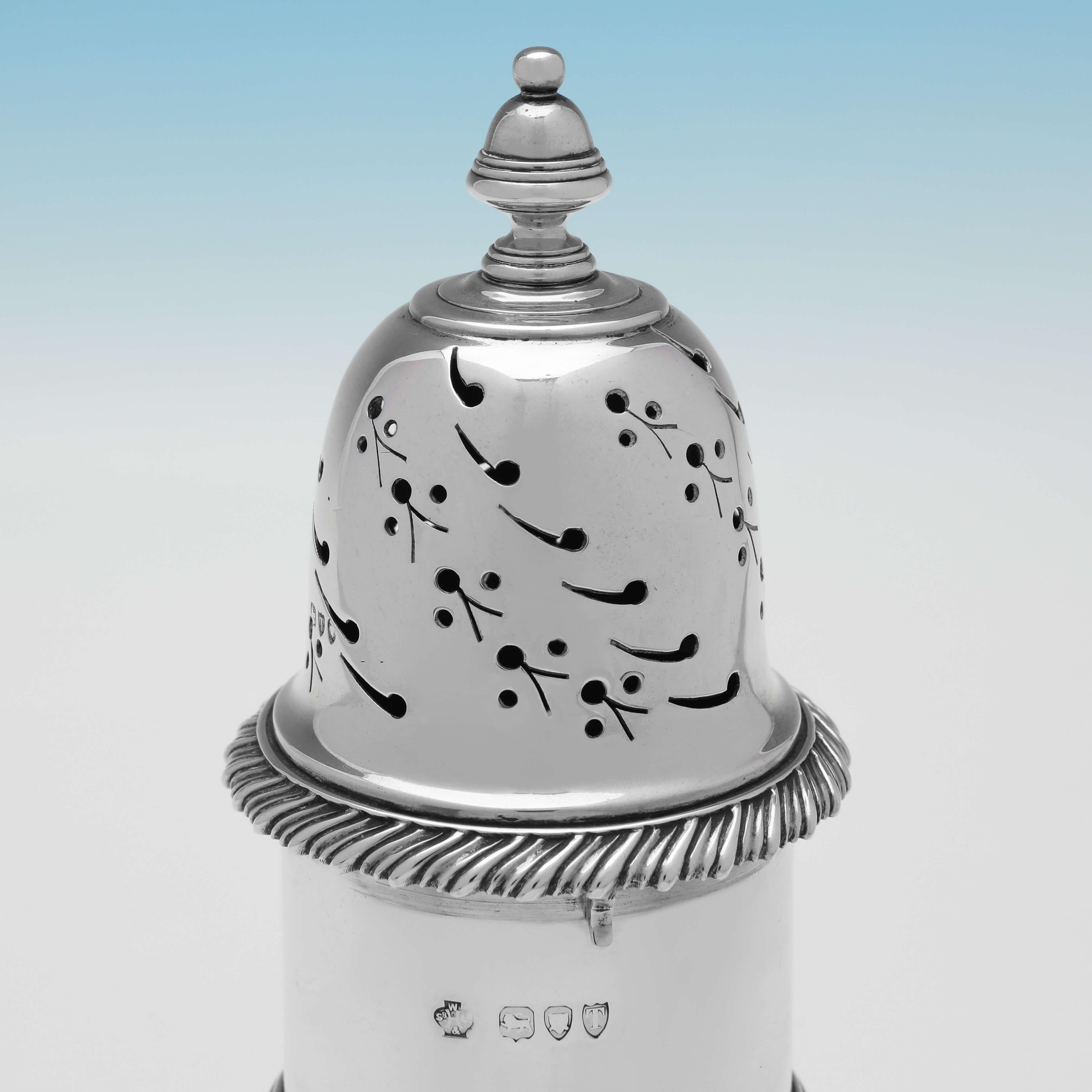 Hallmarked in London in 1894 by William Hutton & Sons, this handsome, Victorian, Antique Sterling Silver Sugar Caster, is in the traditional 'Lighthouse' form. The sugar caster measures 7.5