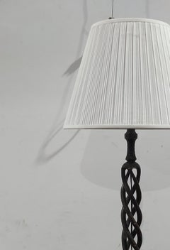 Lighting - African ebony table lamp with recessed lights.