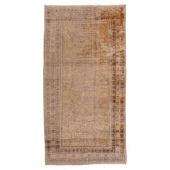 Lightly Distressed Gold Antique Khotan Rug, circa 1910s