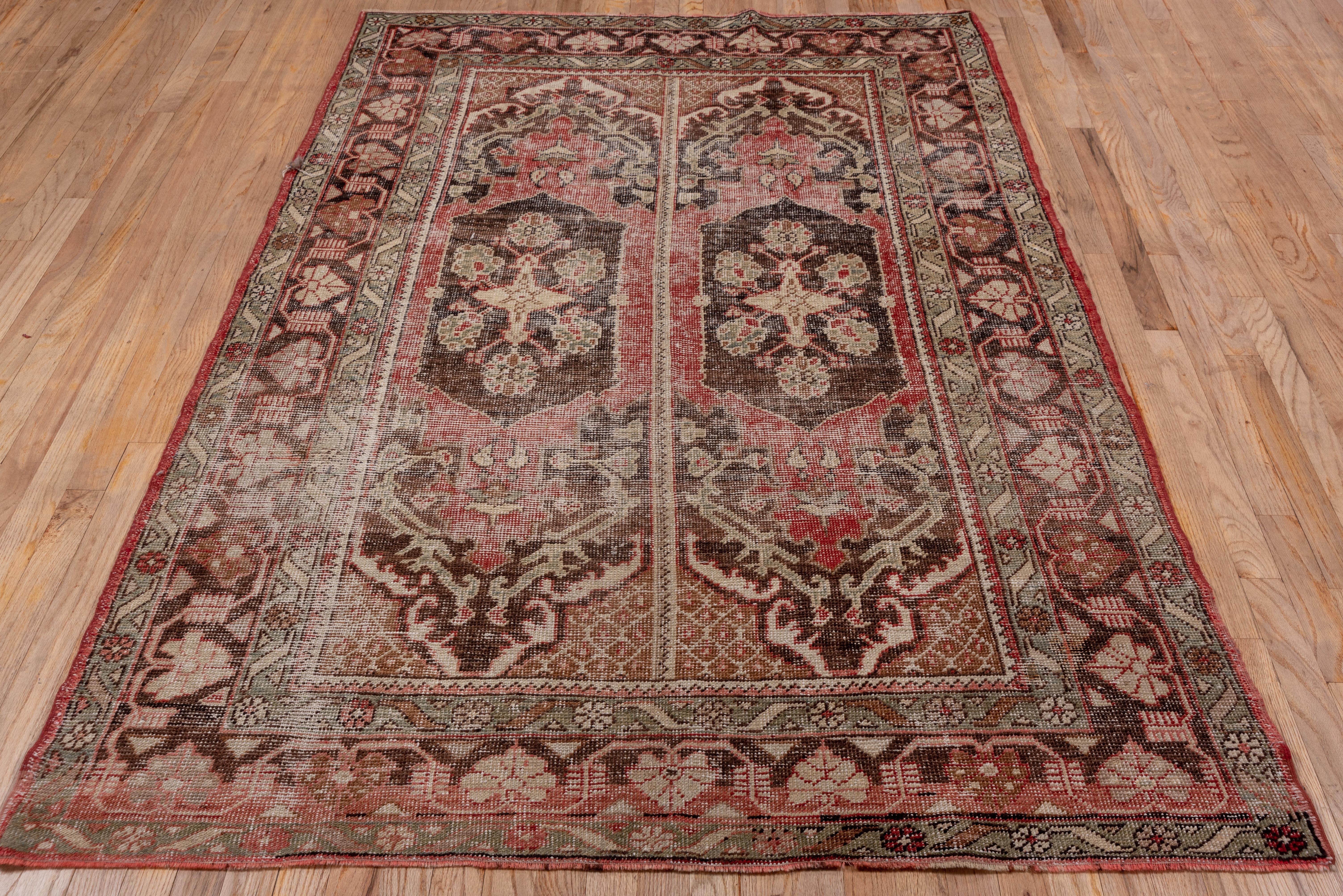 Hand-Knotted Lightly Distressed Turkish Anatolian Rug, Red and Brown Palette For Sale