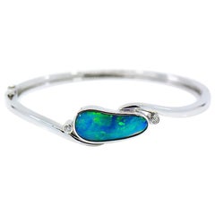 Lightning Ridge Black Opal Diamond Hinged Bangle Bracelet 18 Karat Gold Lightning Ridge Black Opal Diamond Hinged Bangle Bracelet 18 Karat Gold