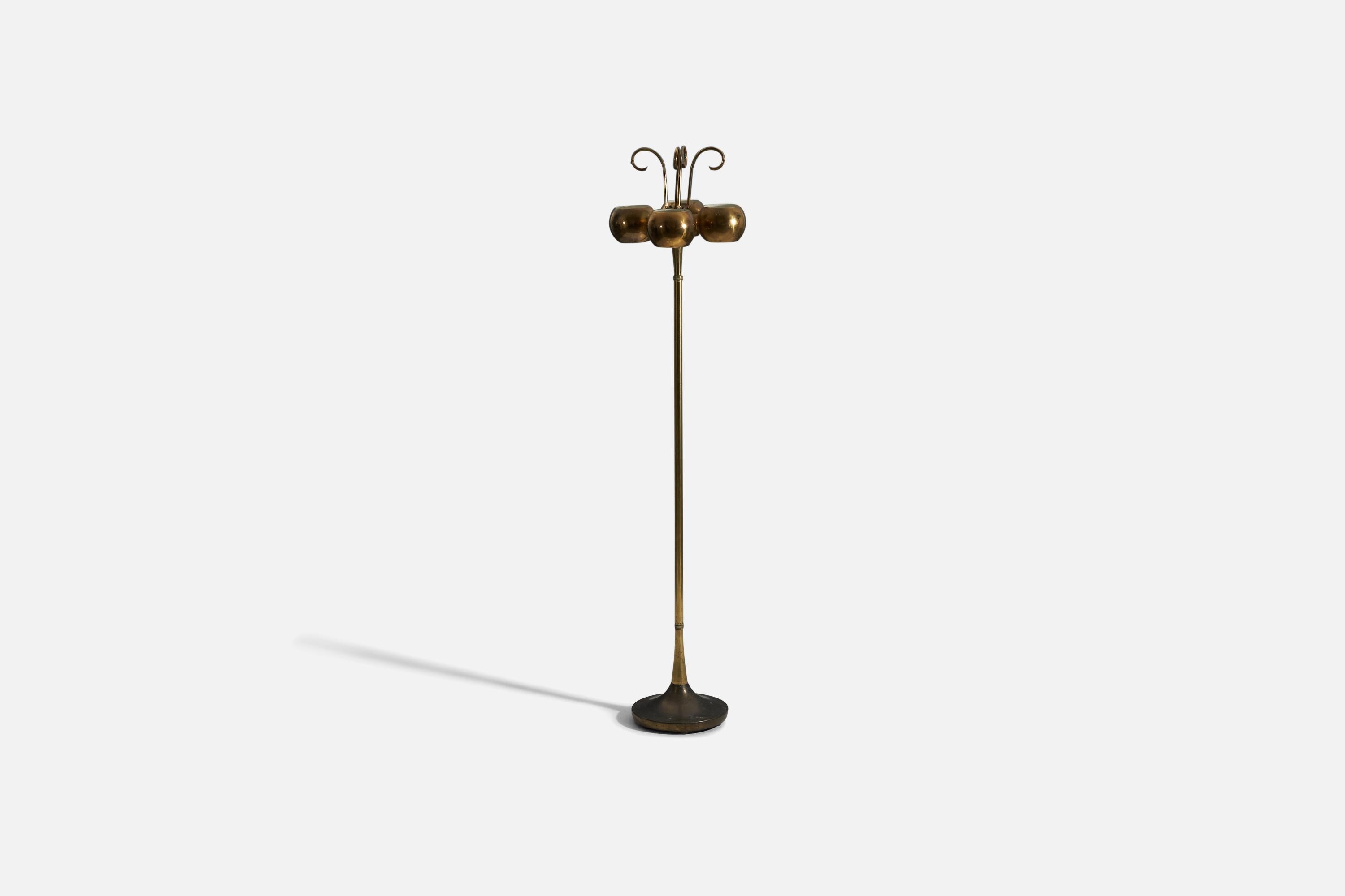 A brass floor lamp featuring four light sources and organic ornamentation, design and production attributed to Lightolier, United States 1950s.