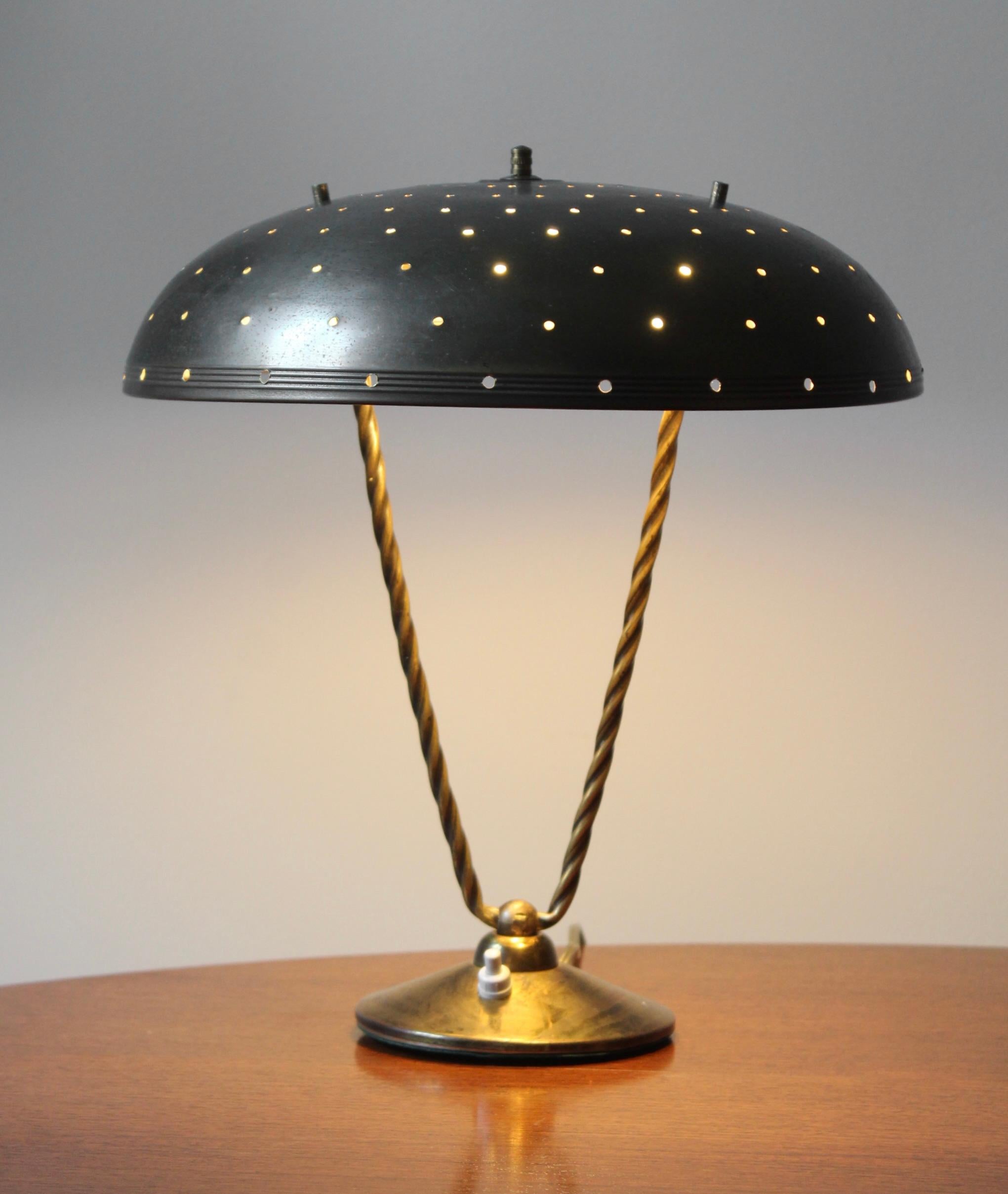 A brass table lamp, design and production attributed to Lightolier, United States, 1950s.