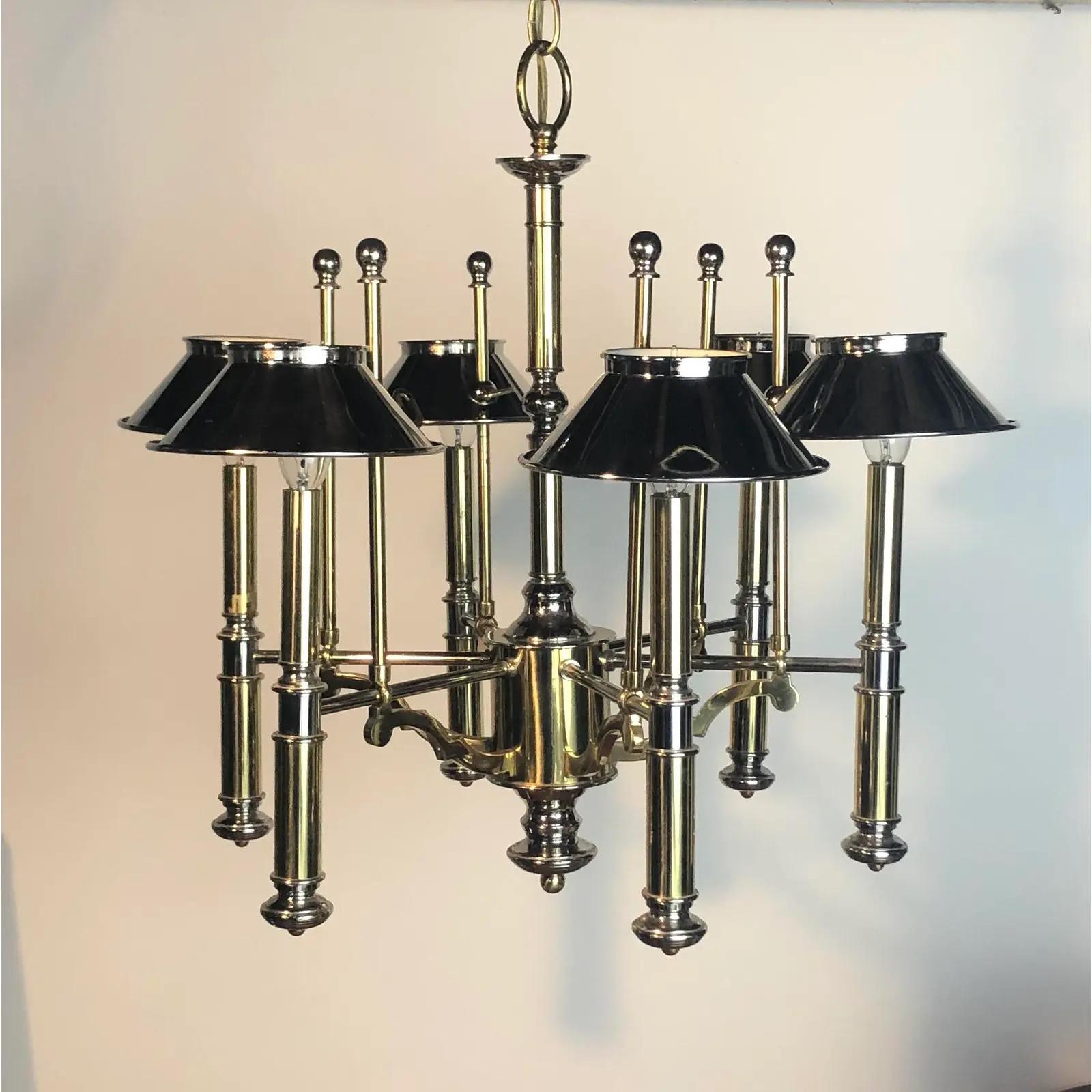 Beautiful mixed metal Bouillotte Chandelier by Lightolier. Brass and chrome a perfect balance. 6 light with adjustable chrome canopies.
Curbside to NYC/Philly $350
