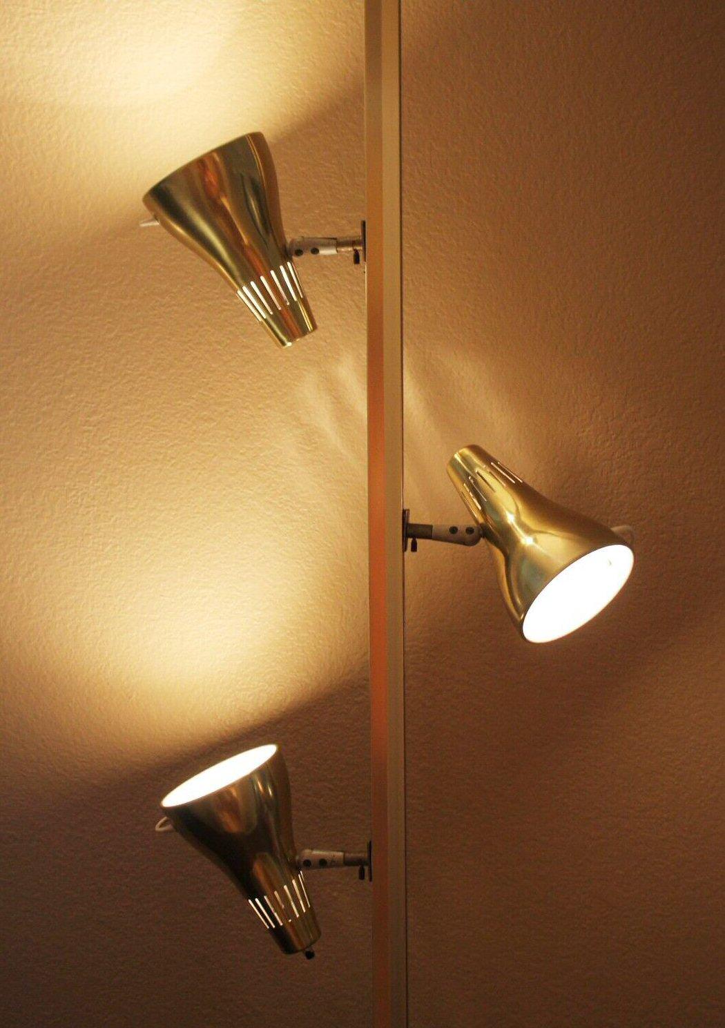 MONUMENTAL!


LIGHTOLIER
MID CENTURY MODERN
LYTESPAN 1959
TENSION POLE LAMP!


ICONIC 3 GOLD SHADES WITH HANDLES!
FITS 8 FT. CEILING


This is both an iconic & gorgeous Lightolier atomic age tension pole lamp! It is a gleaming tower of mid century