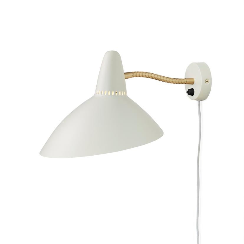 Lightsome Warm White Wall Lamp by Warm Nordic
Dimensions: D25 x W33 x H22 cm
Material: Lacquered steel, Solid brass
Weight: 0.6 kg
Also available in different colours. Please contact us.

A wall light with an elegantly shaped wide shade by the