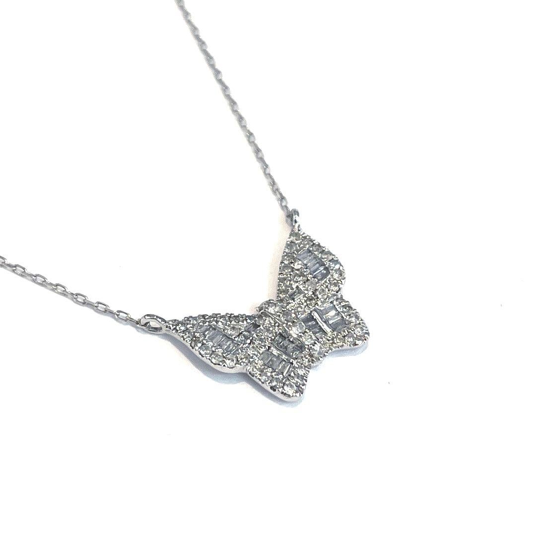 Made from solid 14k white gold, the necklace features a beautiful butterfly pendant adorned with approximately 0.26 total carat weight of diamonds. The pendant weighs 1.42 grams and is expertly crafted with intricate details that make it a true