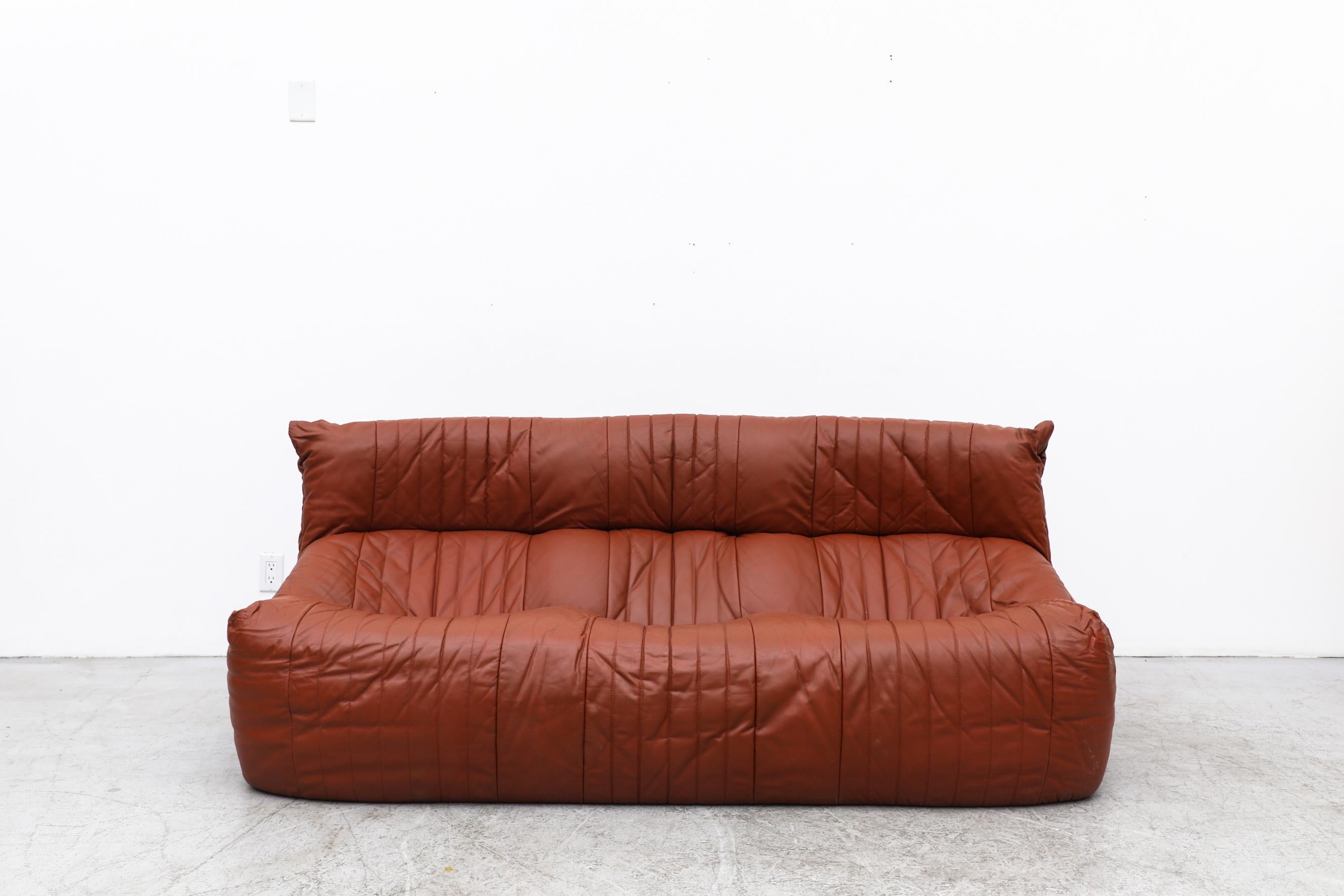 Ligne Roset 'Aralia' sofa by Michel Ducaroy (1925-2009) whose most famous work, the iconic Togo Sofa, marked a highpoint in his career at Ligne Roset. This follows in Togo's footsteps with it's foundation-less comfort and pliable look.
In original