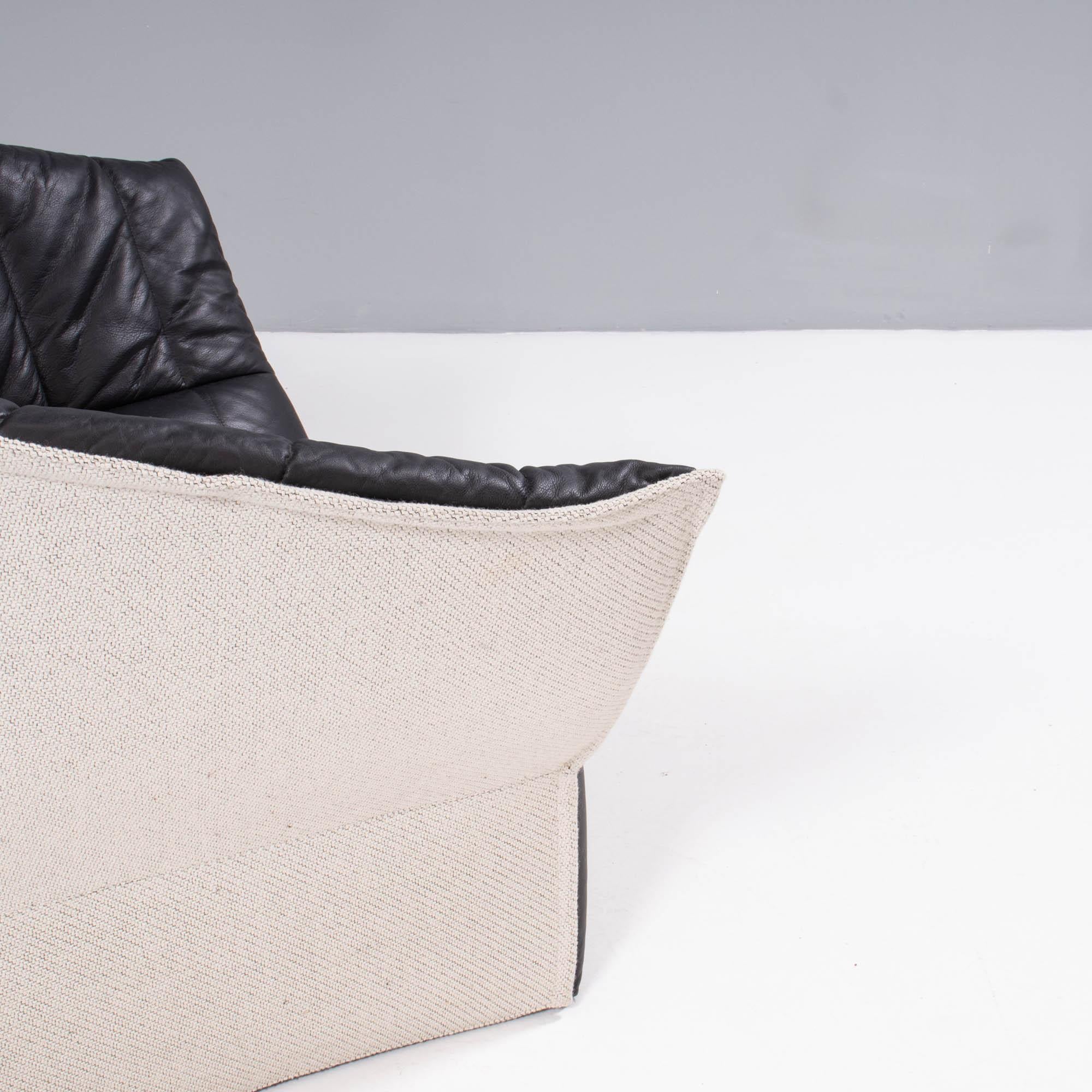Cuir Ligne Roset by Inga Sempé Fauteuil à haut dossier en cuir noir matelassé