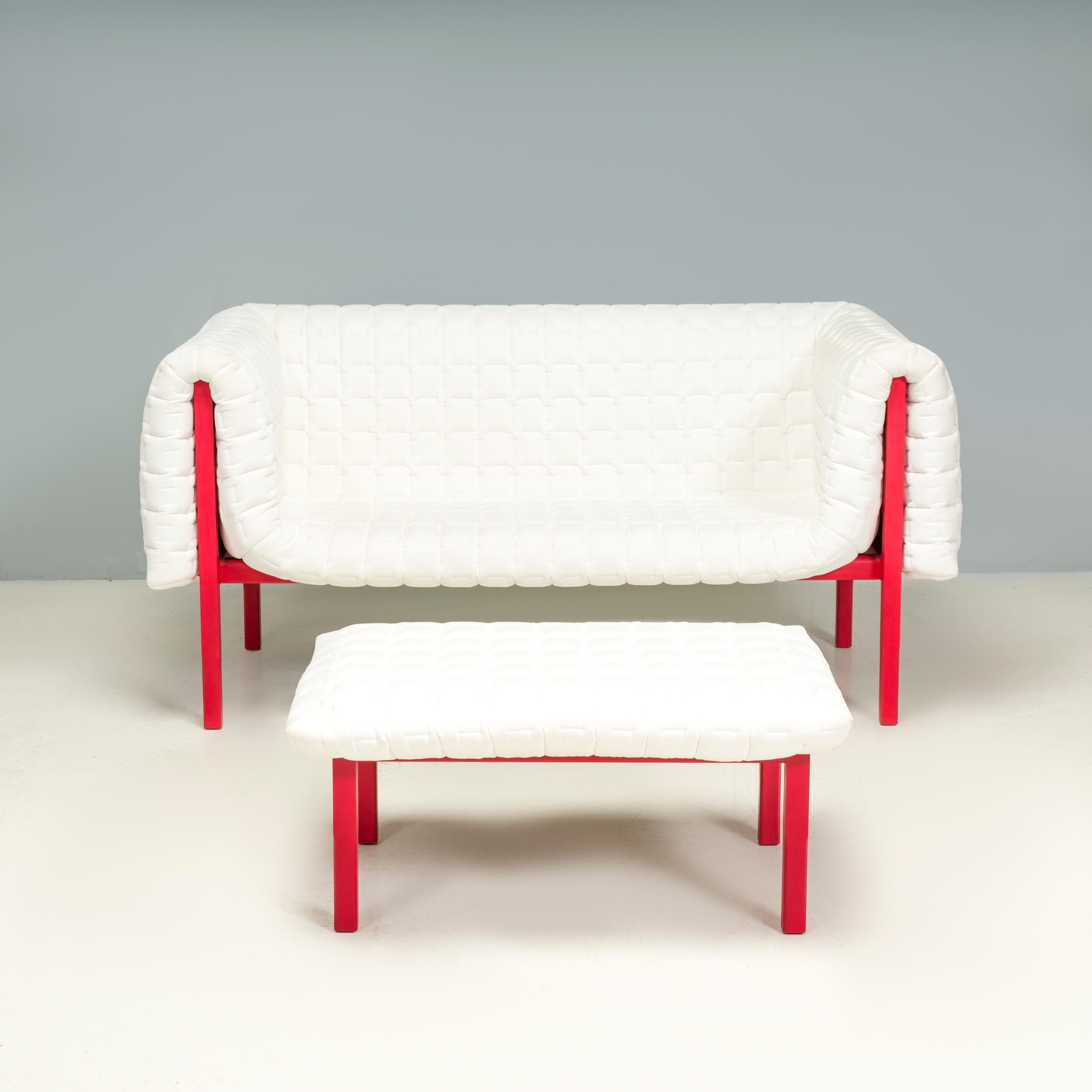 Inga Sempe for Ligne Rose’ Ruche Quilted Settee in white on solid beech structure stained red and footstool

Originally designed by Inga Sempé for Ligne Roset in 2010, the Ruché sofa is a bold and bright piece of design. 

This sofa is constructed