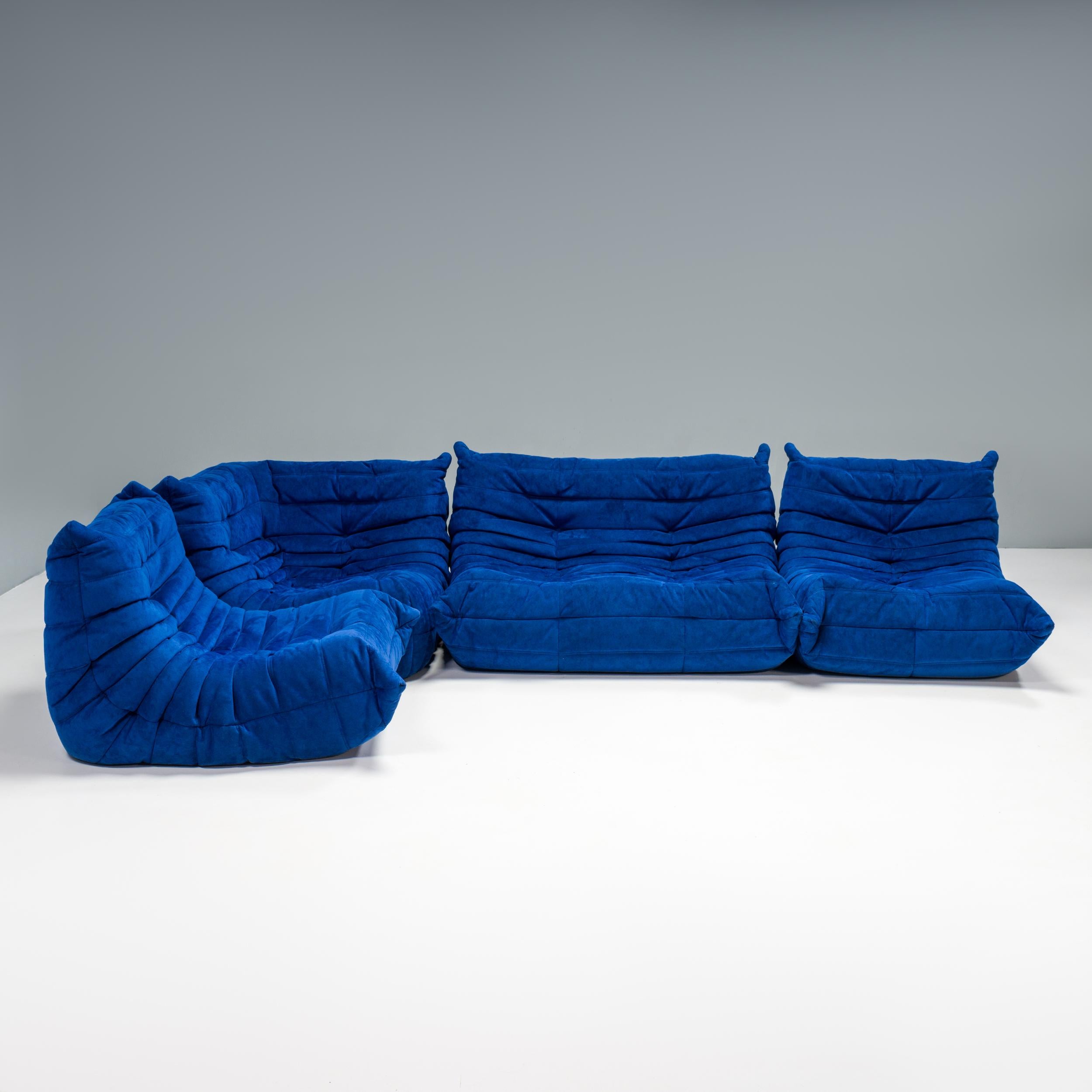 The iconic Togo orange sofa set, originally designed by Michel Ducaroy for Ligne Roset in 1973, has become a design mid century classic.

The sofas are upholstered in a the original alcantara blue fabric. Made completely from foam, with three