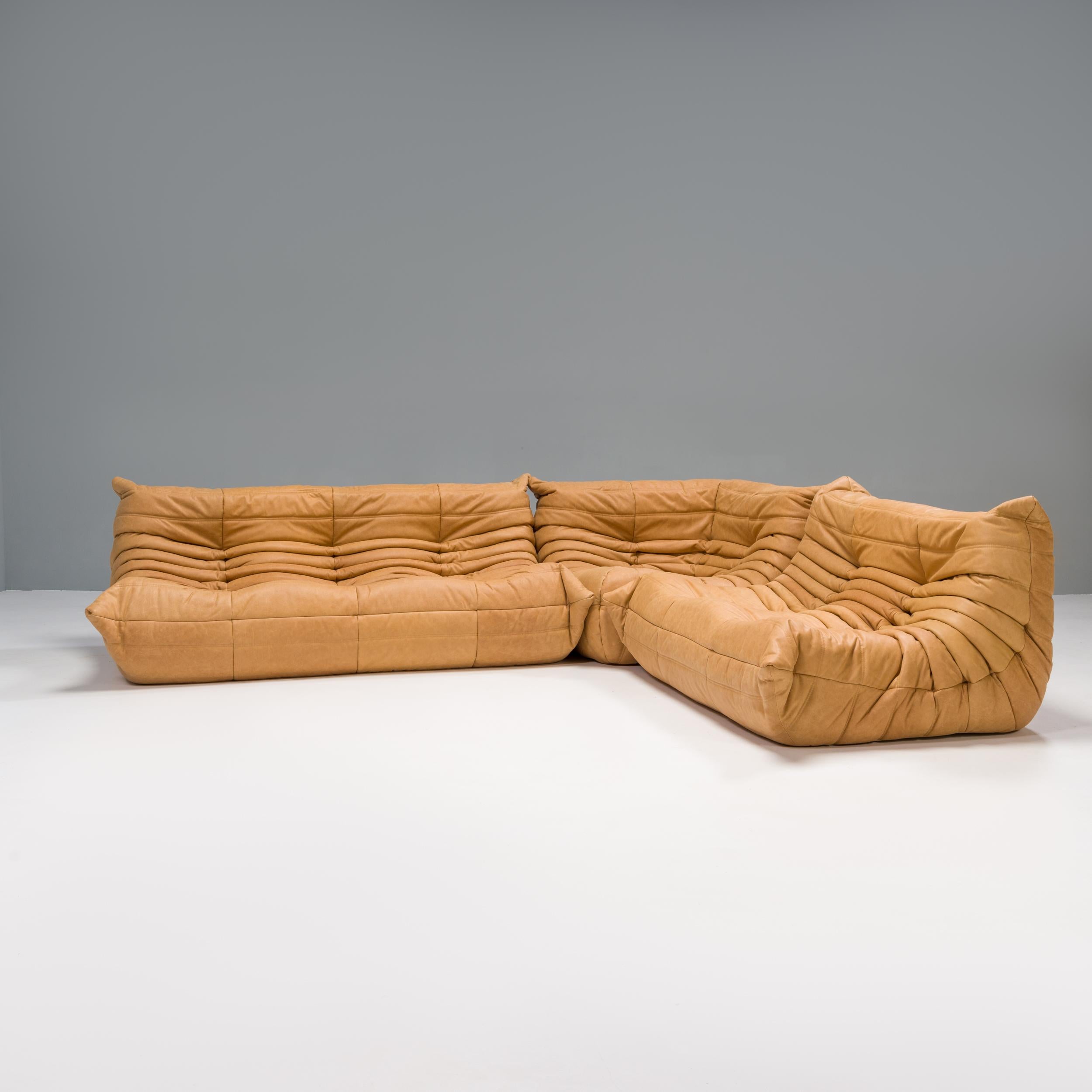 The iconic Togo orange sofa set, originally designed by Michel Ducaroy for Ligne Roset in 1973, has become a design mid century classic.

The sofas have been newly reupholstered in a soft supple camel leather fabric. Made completely from foam, with