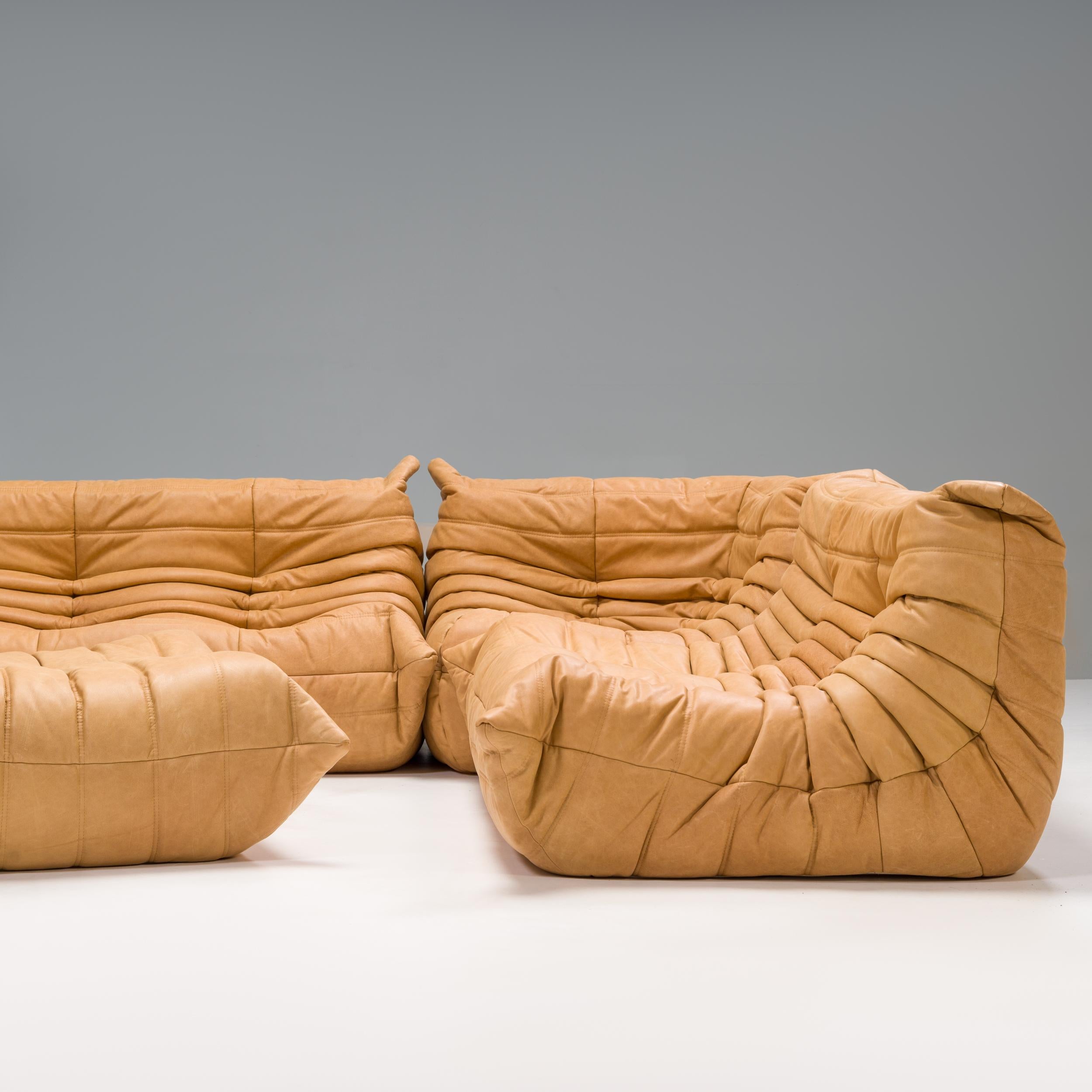 The iconic Togo leather sofa and armchair set, originally designed by Michel Ducaroy for Ligne Roset in 1973, has become a design mid century classic.

The sofas have been newly reupholstered in a soft supple camel leather fabric. Made completely