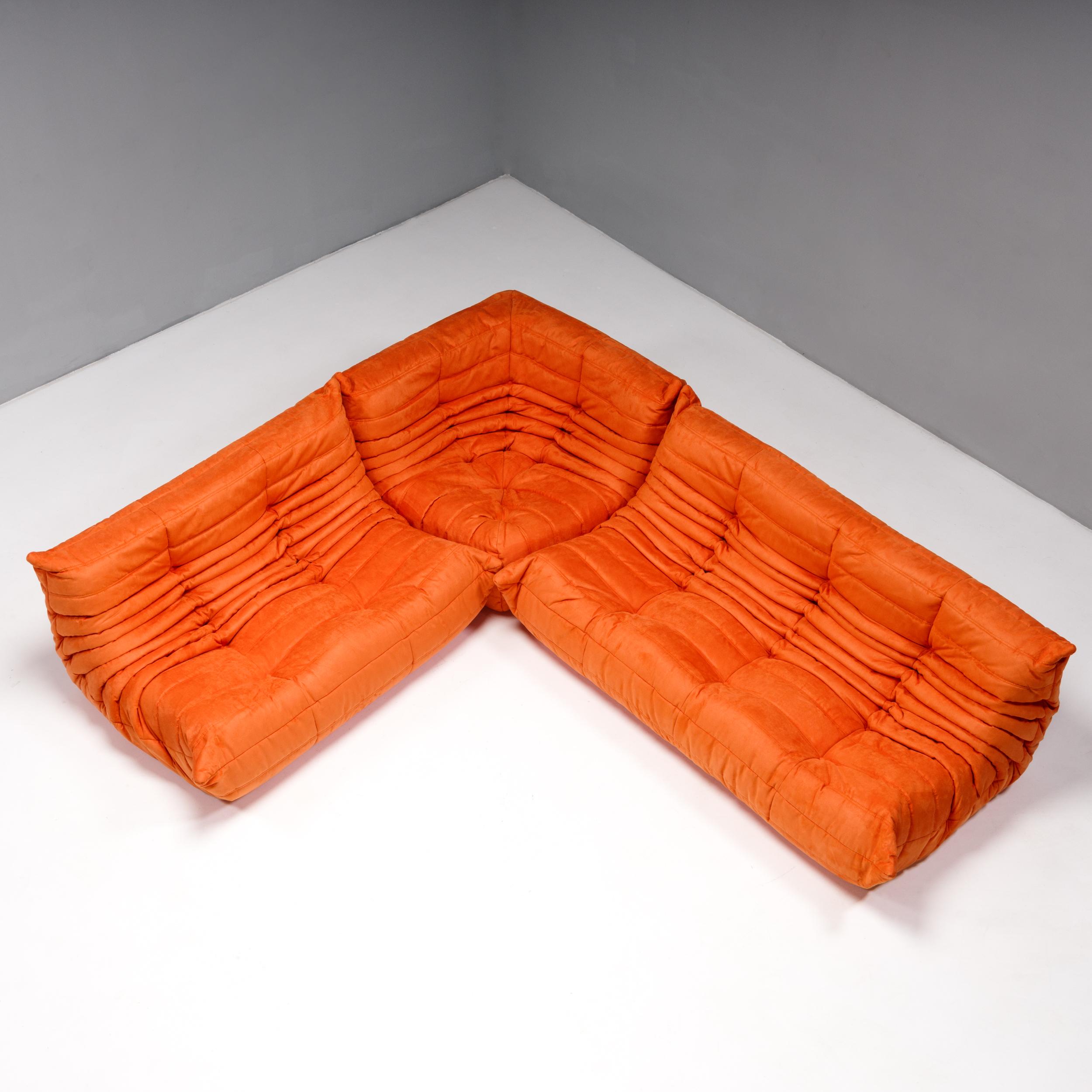 The iconic Togo orange sofa set, originally designed by Michel Ducaroy for Ligne Roset in 1973, has become a design midcentury Classic.

The sofas have been newly reupholstered in a soft bright orange coloured fabric. Made completely from foam, with