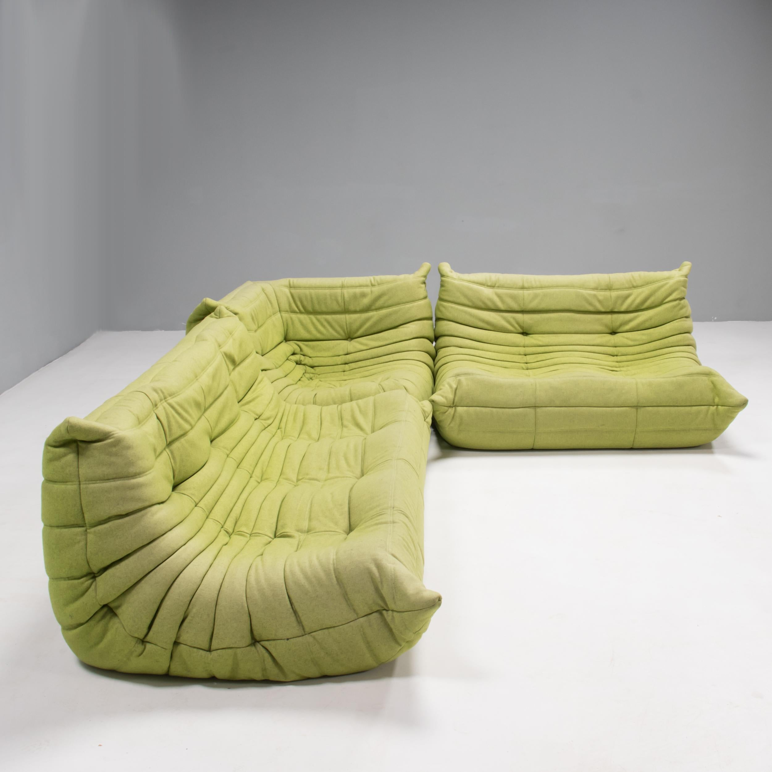 The iconic Togo sofa, originally designed by Michel Ducaroy for Ligne Roset in 1973, has become a design classic. 

These 2-seater sofa, 3 seater and corner are reupholstered in a textured lime green wool fabric and features the instantly