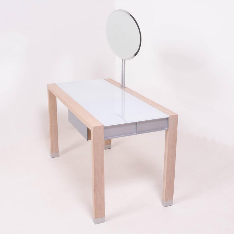 Designed by Peter Maly for Ligne Roset, the streamlined Lumeo dressing table will add instant sophistication to a contemporary bedroom or dressing room.

Constructed with a lacquered blonde oak hardwood with aluminium lacquer detailing, the