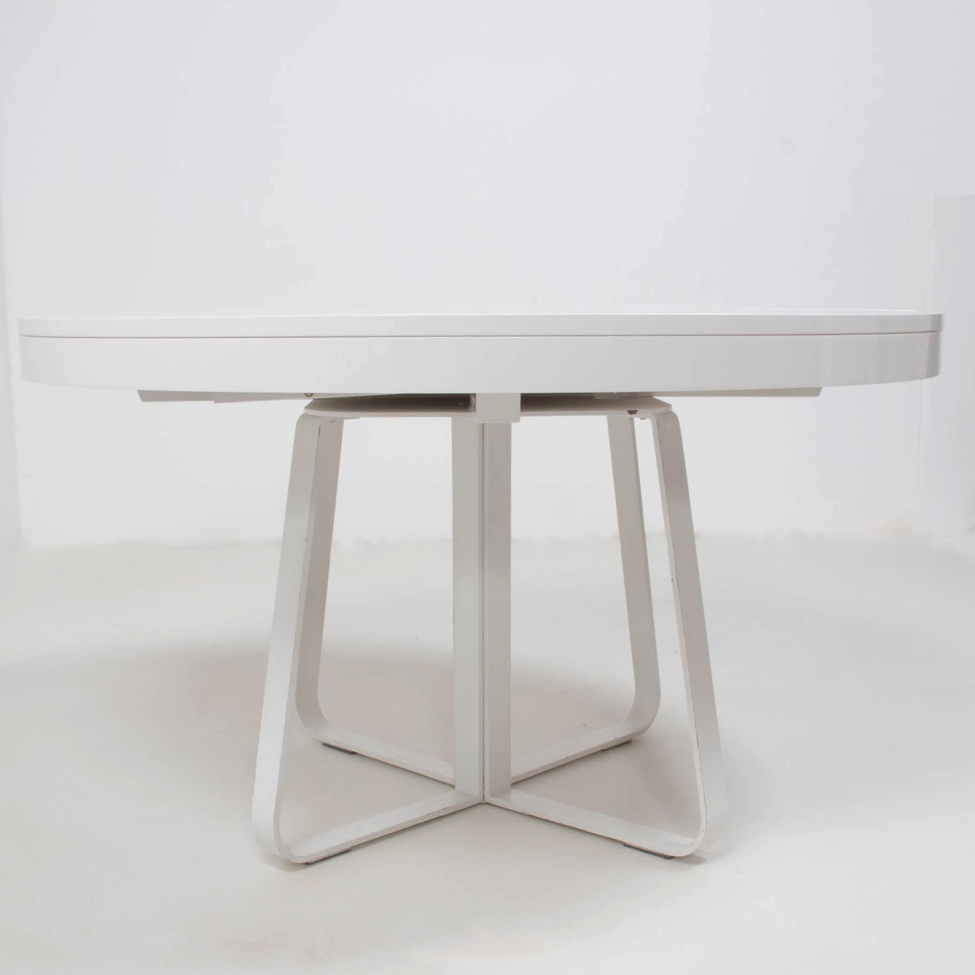 Designed by Thibault Desombre for Ligne Roset, the Ava dining table combines sleek style with modern practicality.

At the smaller size, the round dining table seats 4 people with a beautiful smooth, white lacquered finish. The central base is