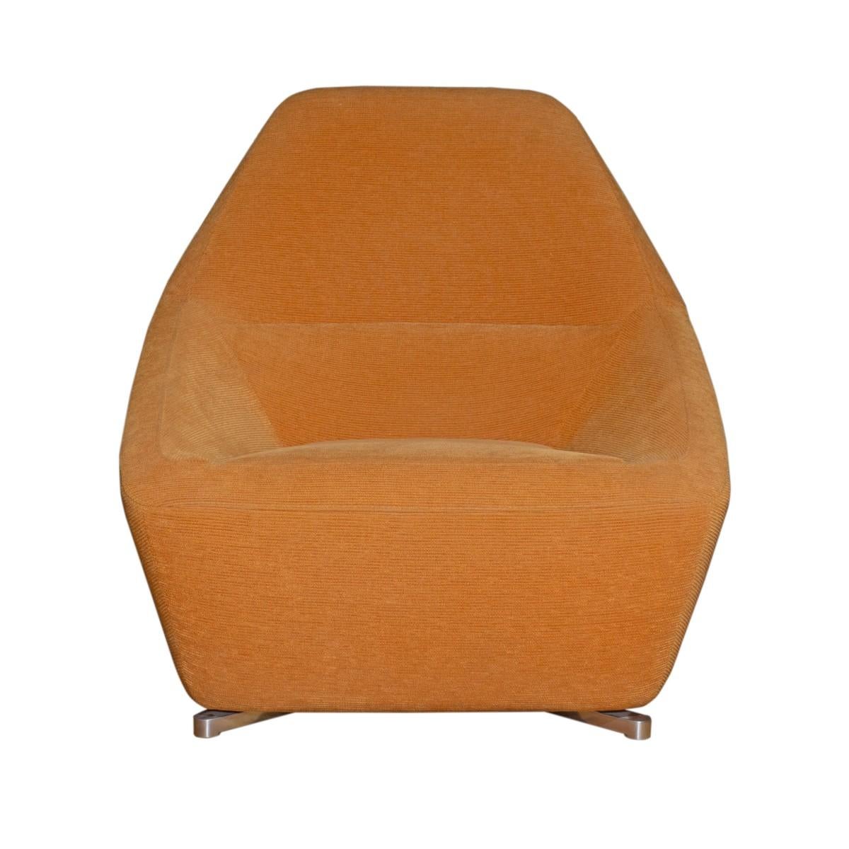 A sculptural Ligne Roset chair and ottoman in pale orange mohair, France, circa 2010.

Dimensions:
Chair: 37 inches L x 34 inches D x 35 inches H
Seat height: 16 inches
Ottoman: 27 inches L x 17 inches D x 15 inches H.
 