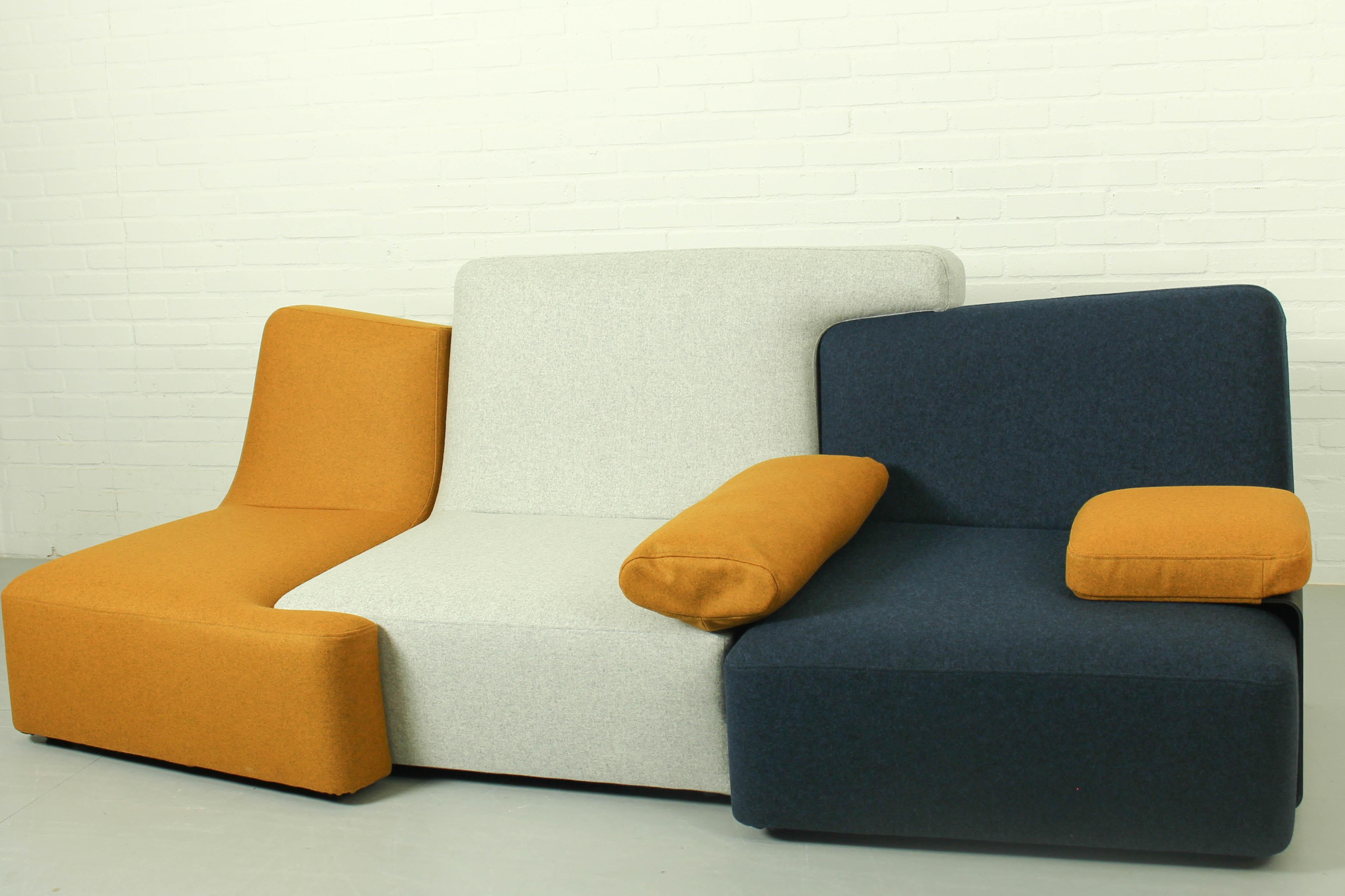 Confluences asymmetrical elements Philippe Nigro Ligne Roset France. Beautiful new wool melange (Kvadrat and Camira fabric) upholstery in various colors. Elements are in as good as new condition. The set consists of 5 elements, one armrest (in black