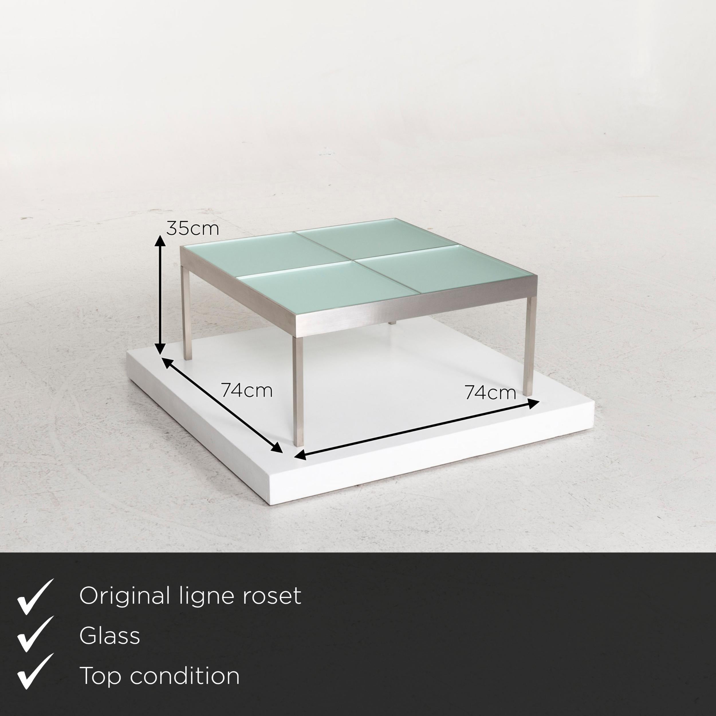 We present to you a Ligne Roset Damier glass coffee table square.

 

 Product measurements in centimeters:
 

 Depth 74
 Width 74
 Height 35.





 