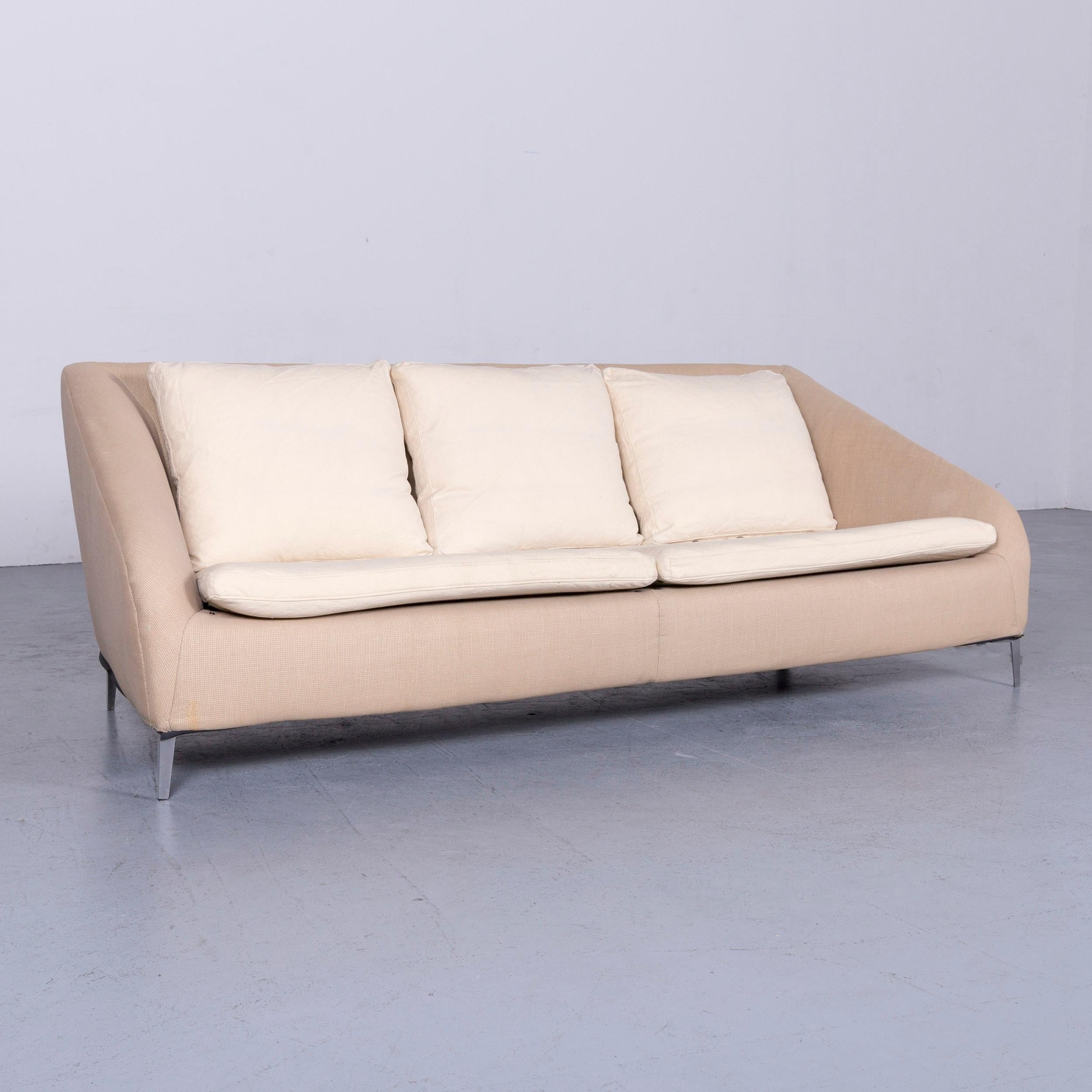 We bring to you an Ligne Roset designer fabric sofa brown beige three-seat couch.


























