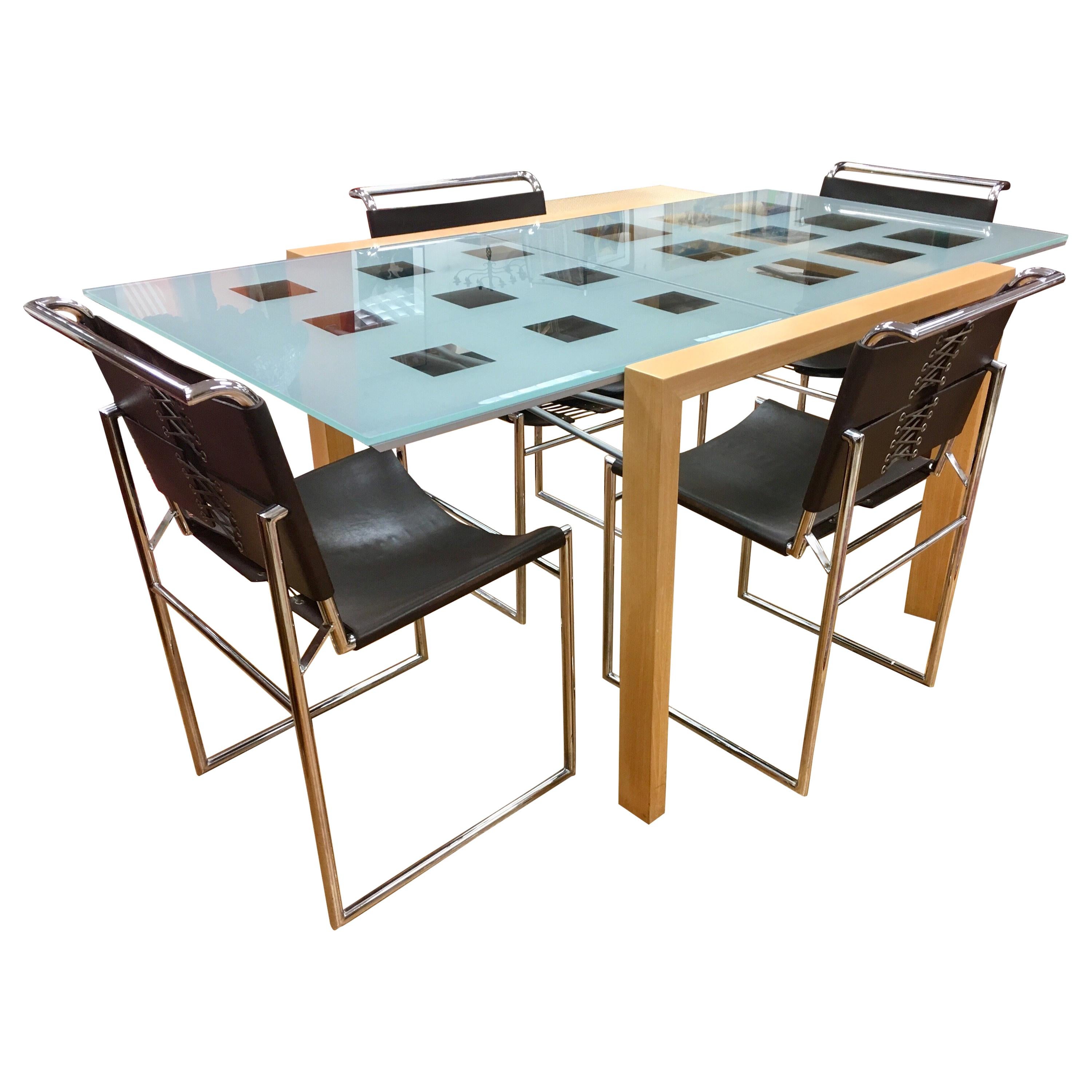 Ligne Roset Dining Room Expandable Table and Marcel Breuer Leather Corset  Chairs at 1stDibs