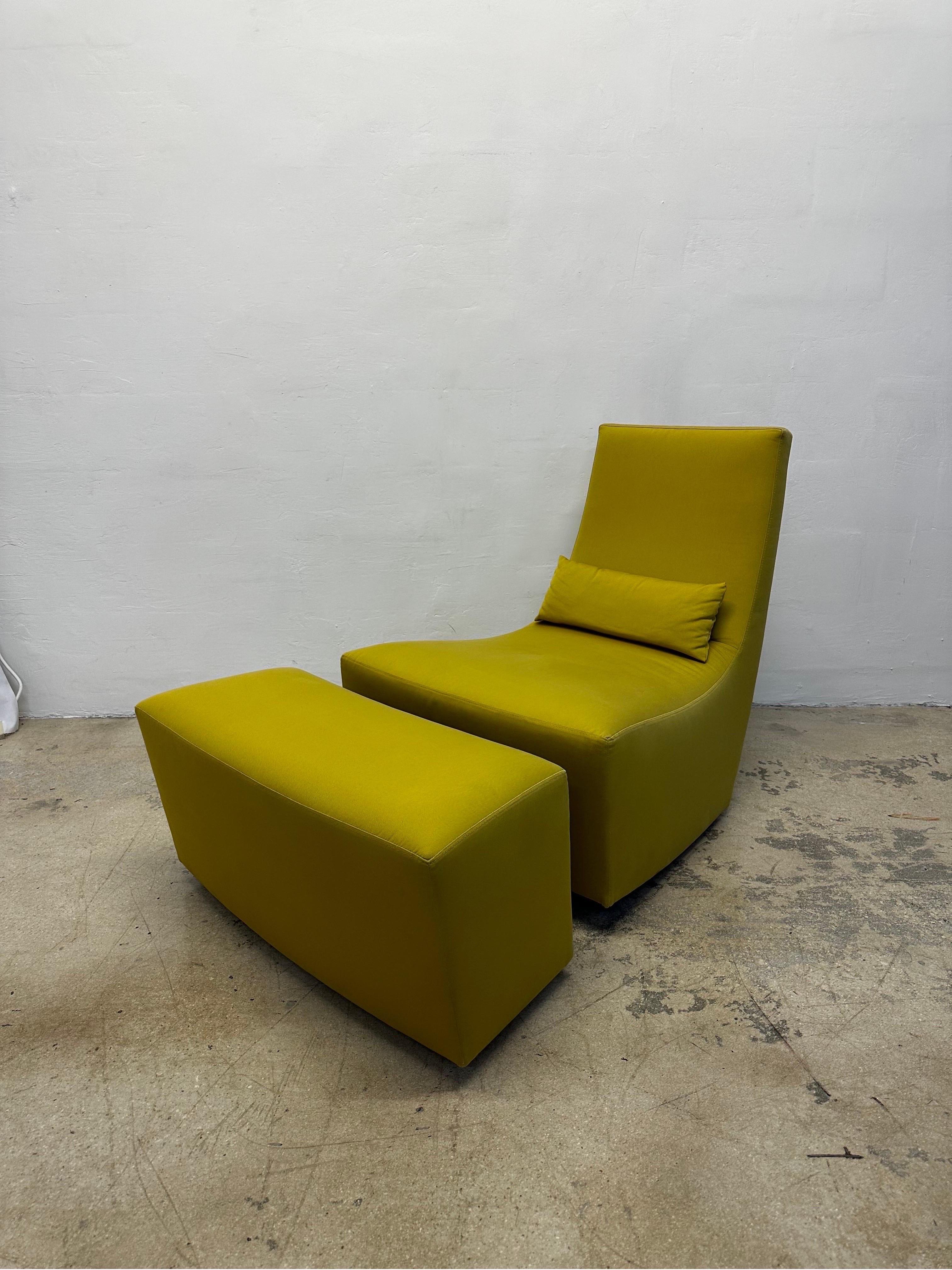 Ligne Roset “Neo” fireside rocking chair and footrest with original canary yellow fabric by Alban-Sebastian Giles .  Use with existing fabric or have reupholstered.

Measurements:
Chair W28” D34.5” H31.5” SH 14.5
Footrest W32” D13.6” H15”