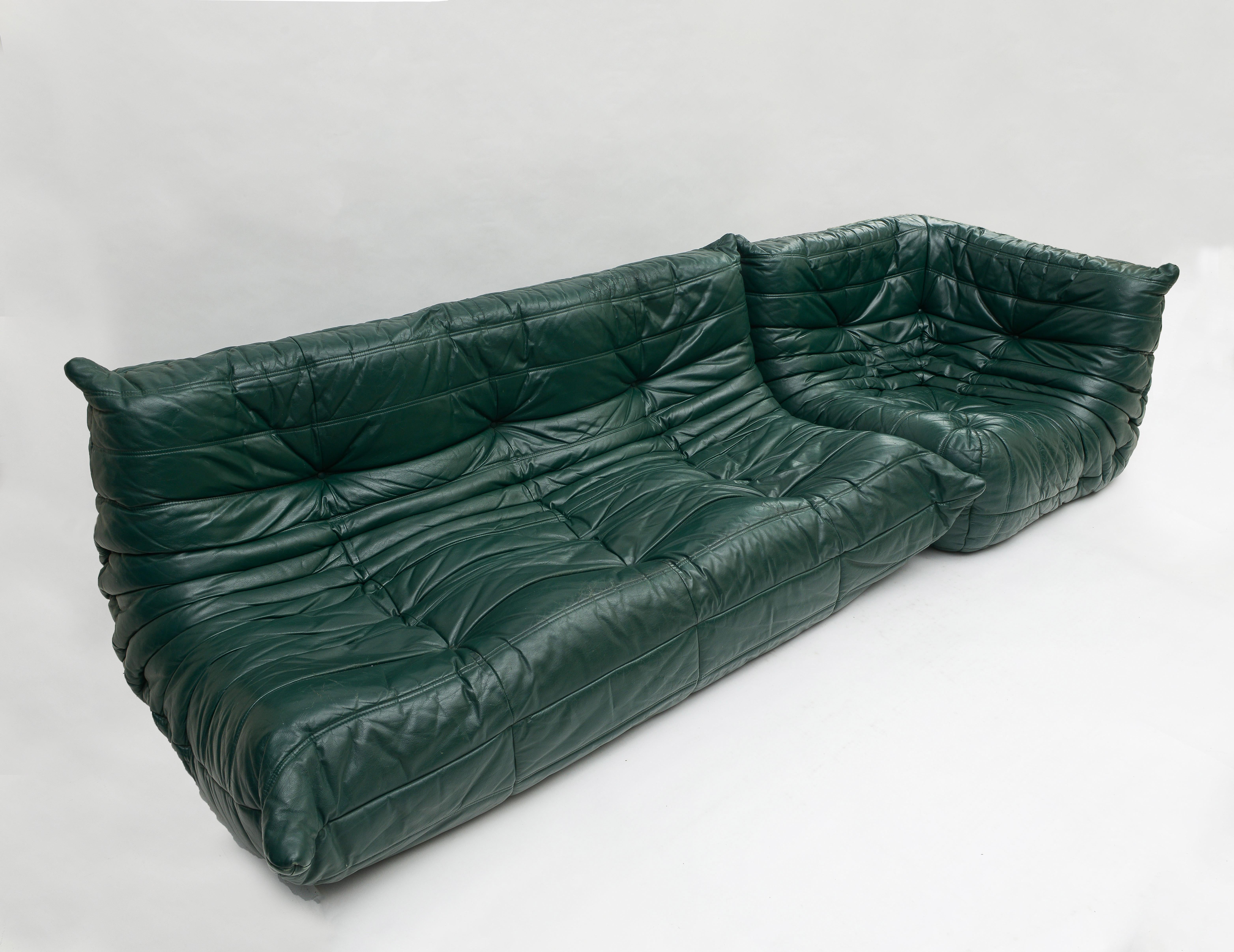 Beautiful green leather ligne roset sofa and corner chair. Green leather is lovely and supple. Seating is very comfortable. 
Great Vintage Design pieces
France 1980's

Measures: Sofa is 67 wide, 27 high, 38 inches deep, sh 12 inches

Chair is