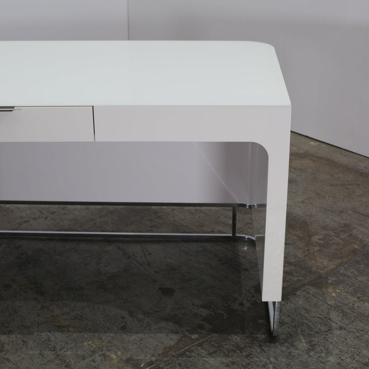 Introducing the elegant and sophisticated Hyannis Port Desk by Ligne Roset. Crafted with high quality materials, this desk exudes luxury and style. The sleek design features a sleek top and a unique metal frame, creating a perfect balance of modern