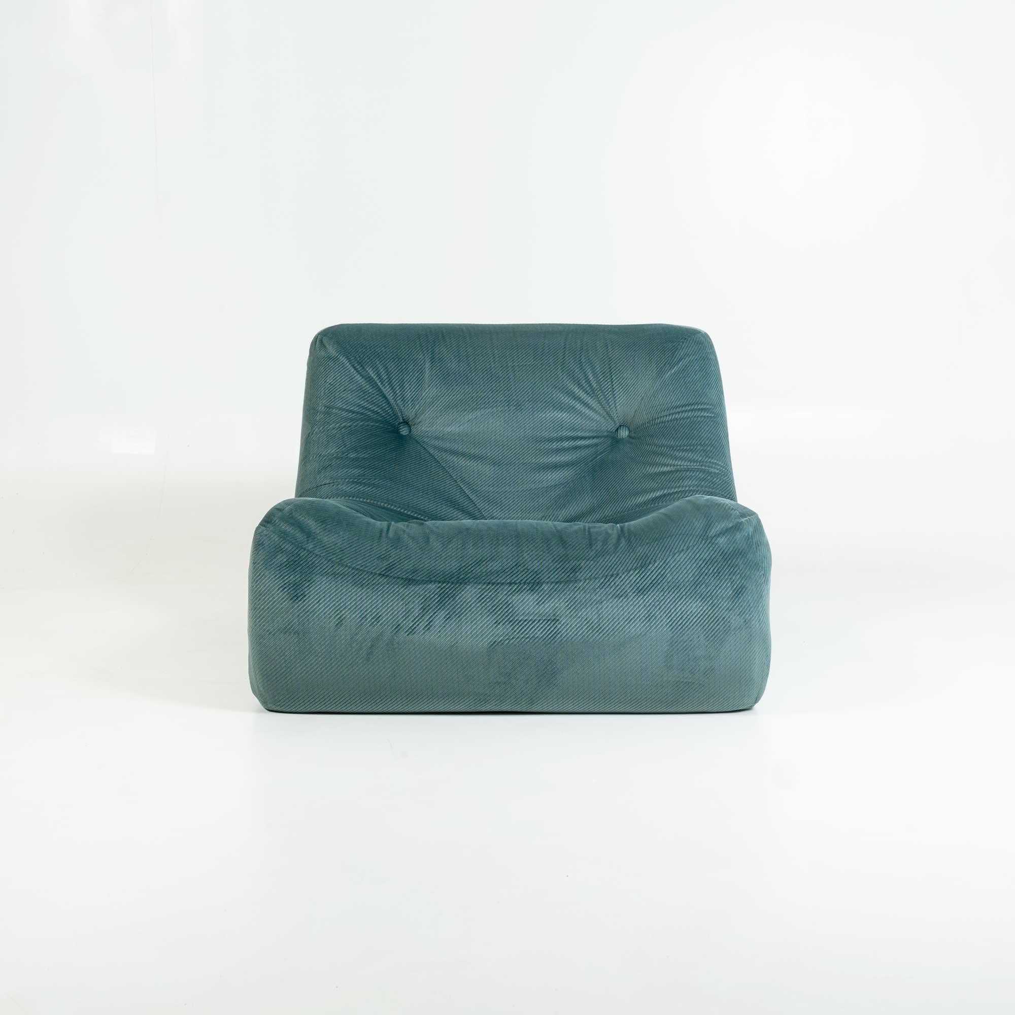 This is the Kali Lounge Chair designed by Michel Ducaroy for Ligne Roset, France, upholstered in original Emerald Corduroy with blue stitching. A very unique fabric, soft and in good condition. We currently have 2, listing is for a single lounge