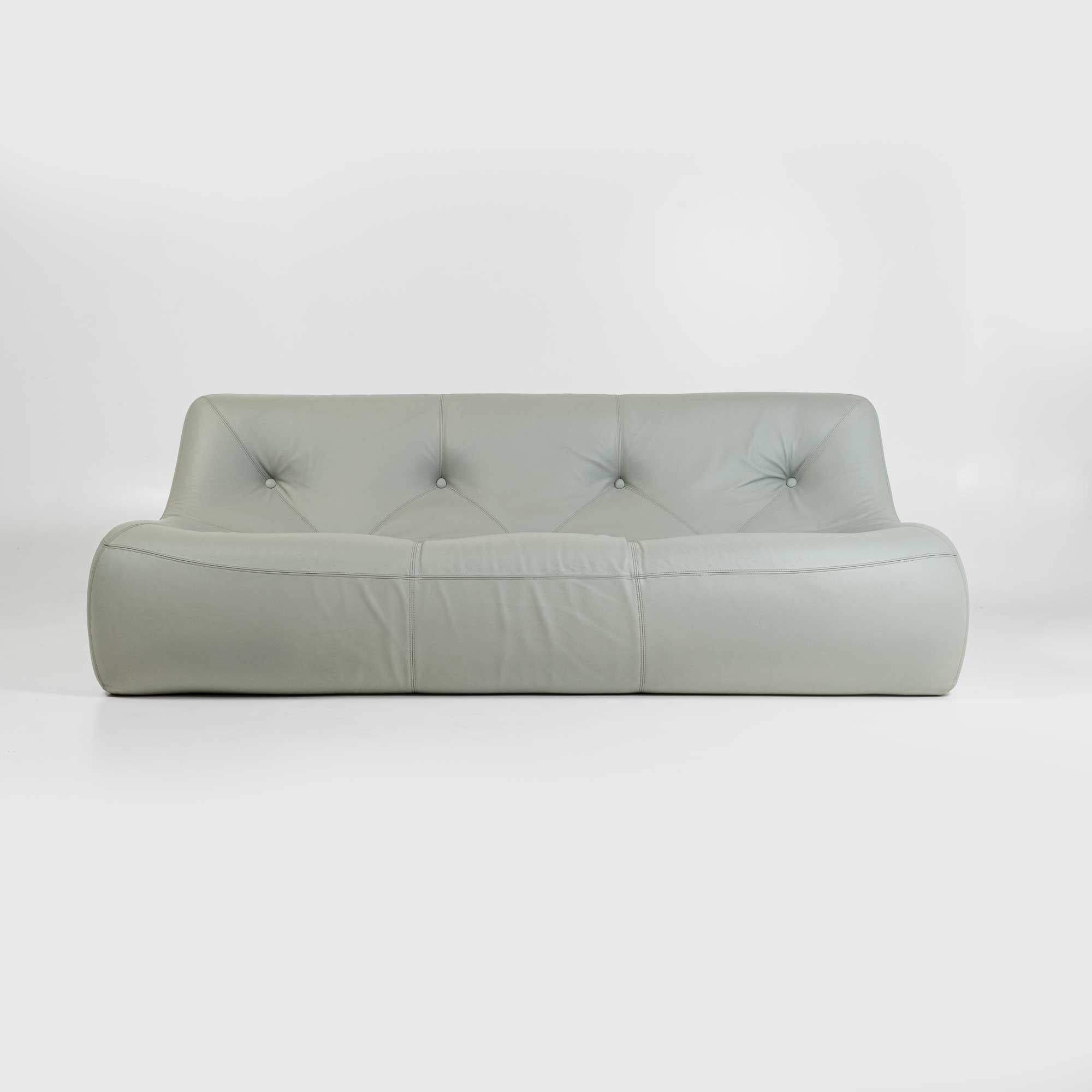This is the Kali three seater sofa designed by Michel Ducaroy for Ligne Roset, France, upholstered in soft gray/ off-white leather. Some patina and wears on the leather, no tears. Ready to be used.

The 'Kali' sofa by Michel Ducaroy for Ligne
