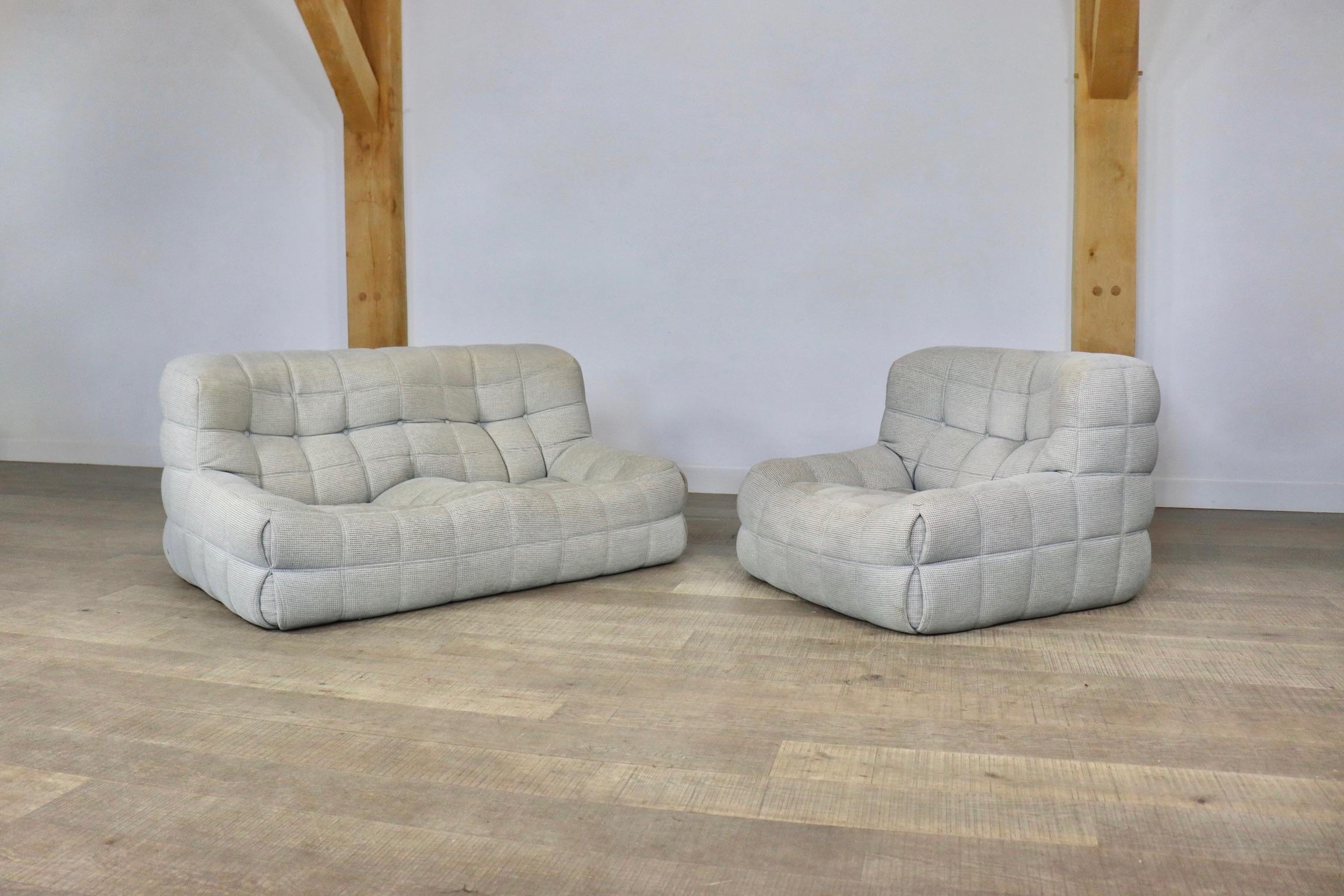 Stunning and extremely comfortable Kashima lounge chair and sofa in stunning light blue and cream Kvadrat fabric upholstery by Michel Ducaroy for Ligne Roset, 1970s. This set is in excellent condition and will bring comfort and luxurious design into